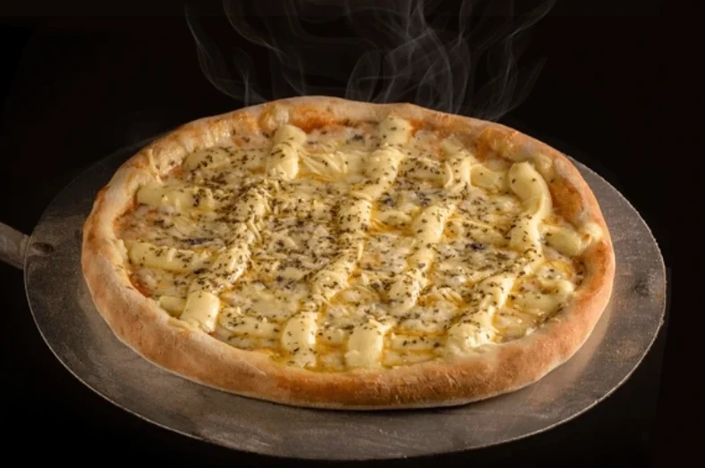 Freshly baked white pizza with herbs