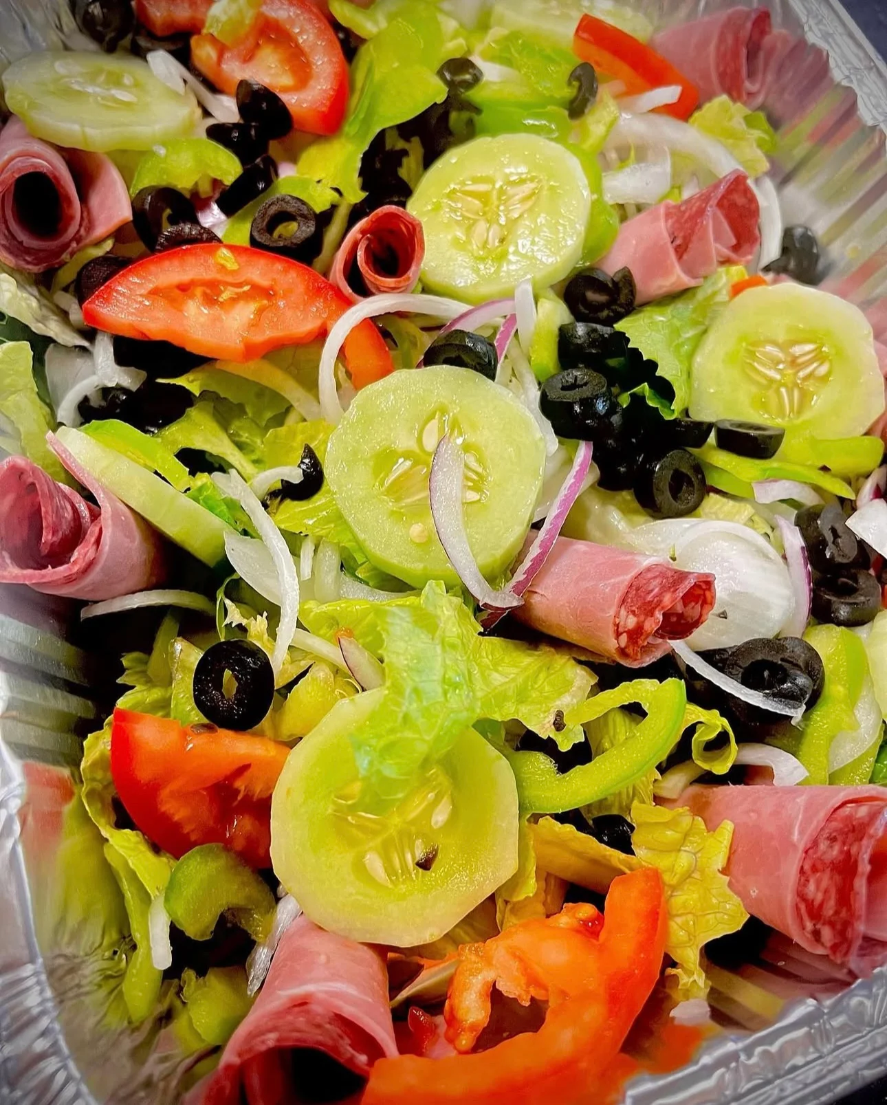 Italian antipasto salad with cured meats and fresh vegetables