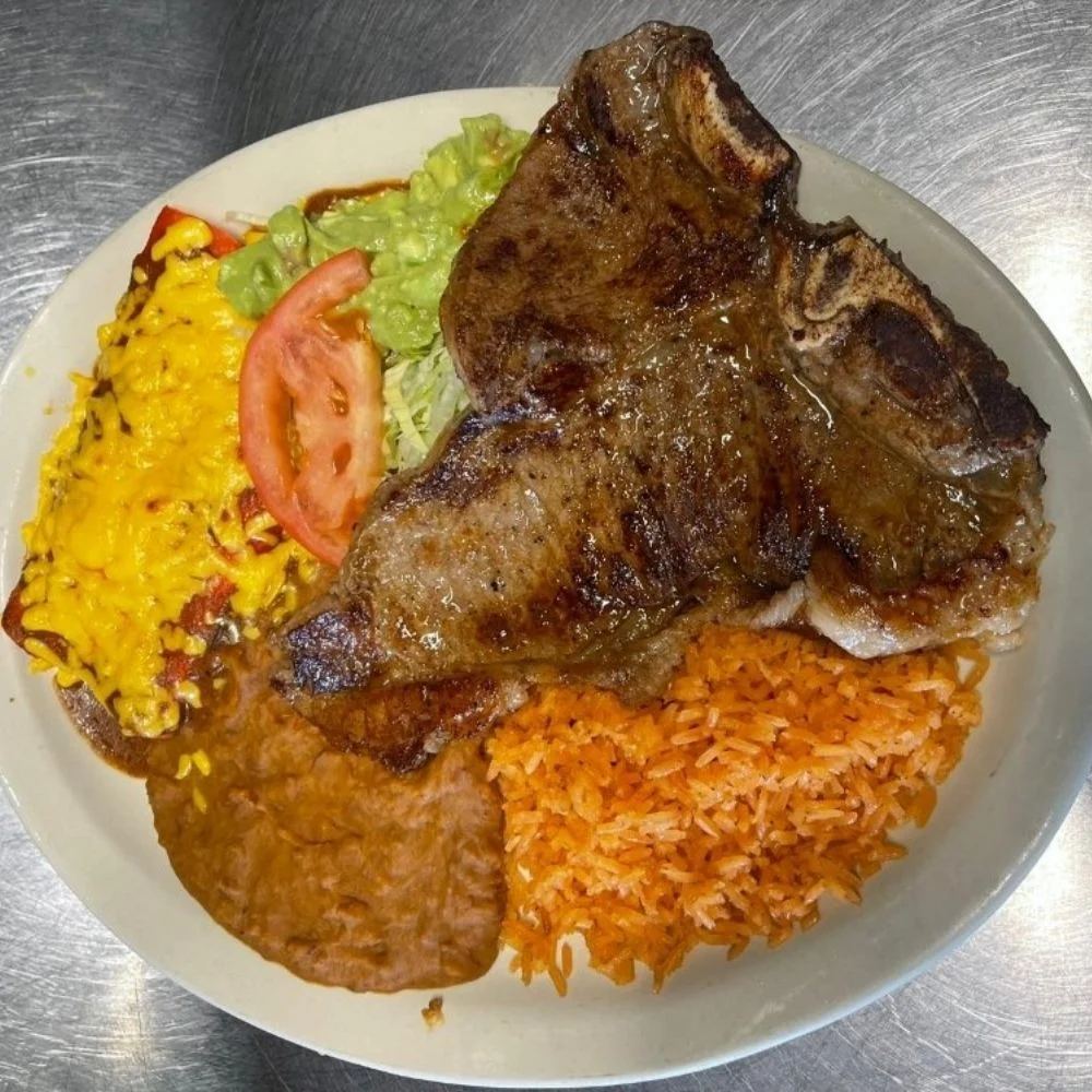 Grilled carne asada plate with rice and beans