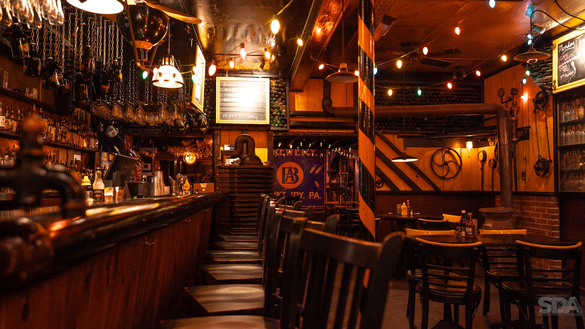 Cozy restaurant interior with vibrant lighting and rustic decor