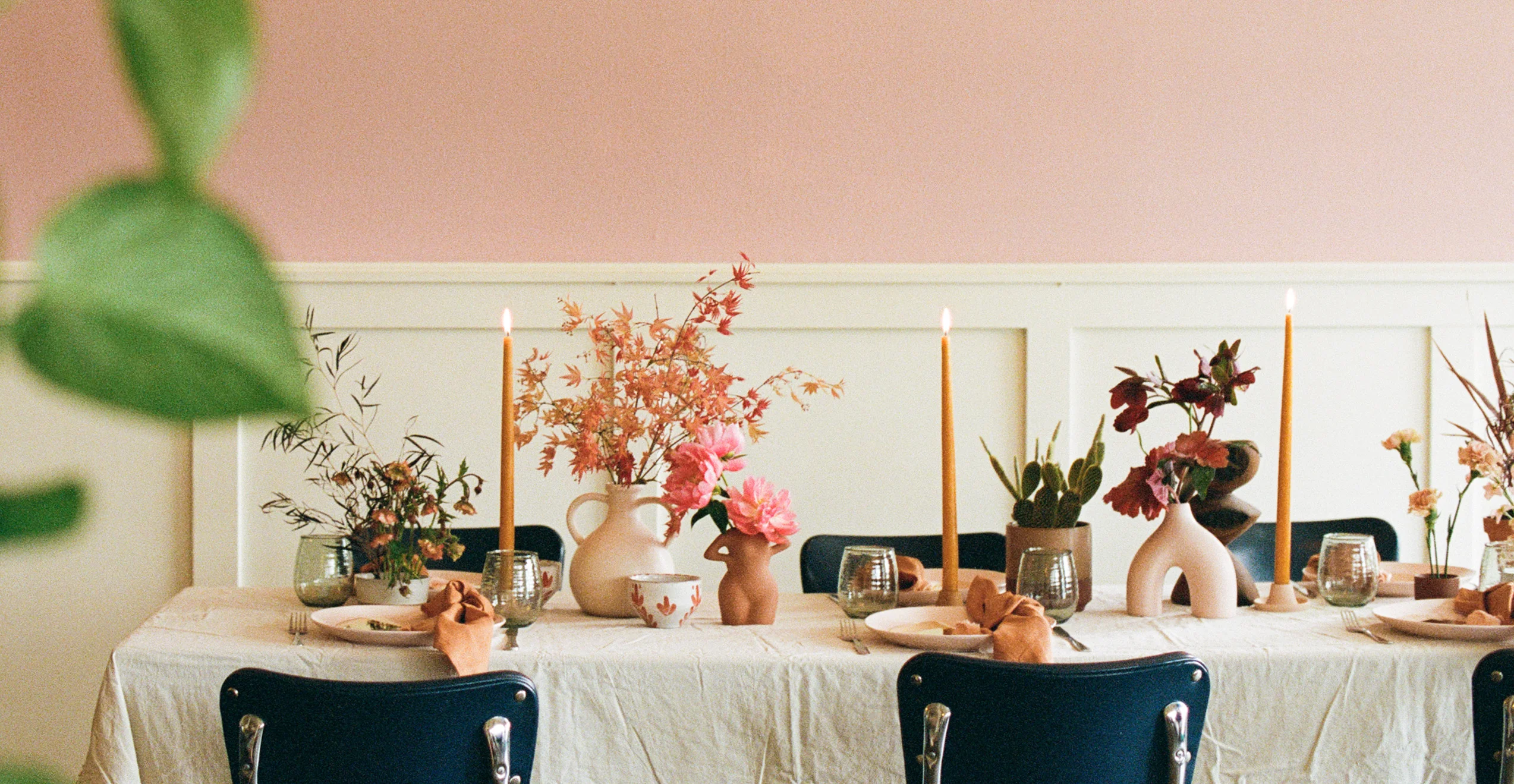 Vibrant restaurant interior with guests enjoying drinks and conversation