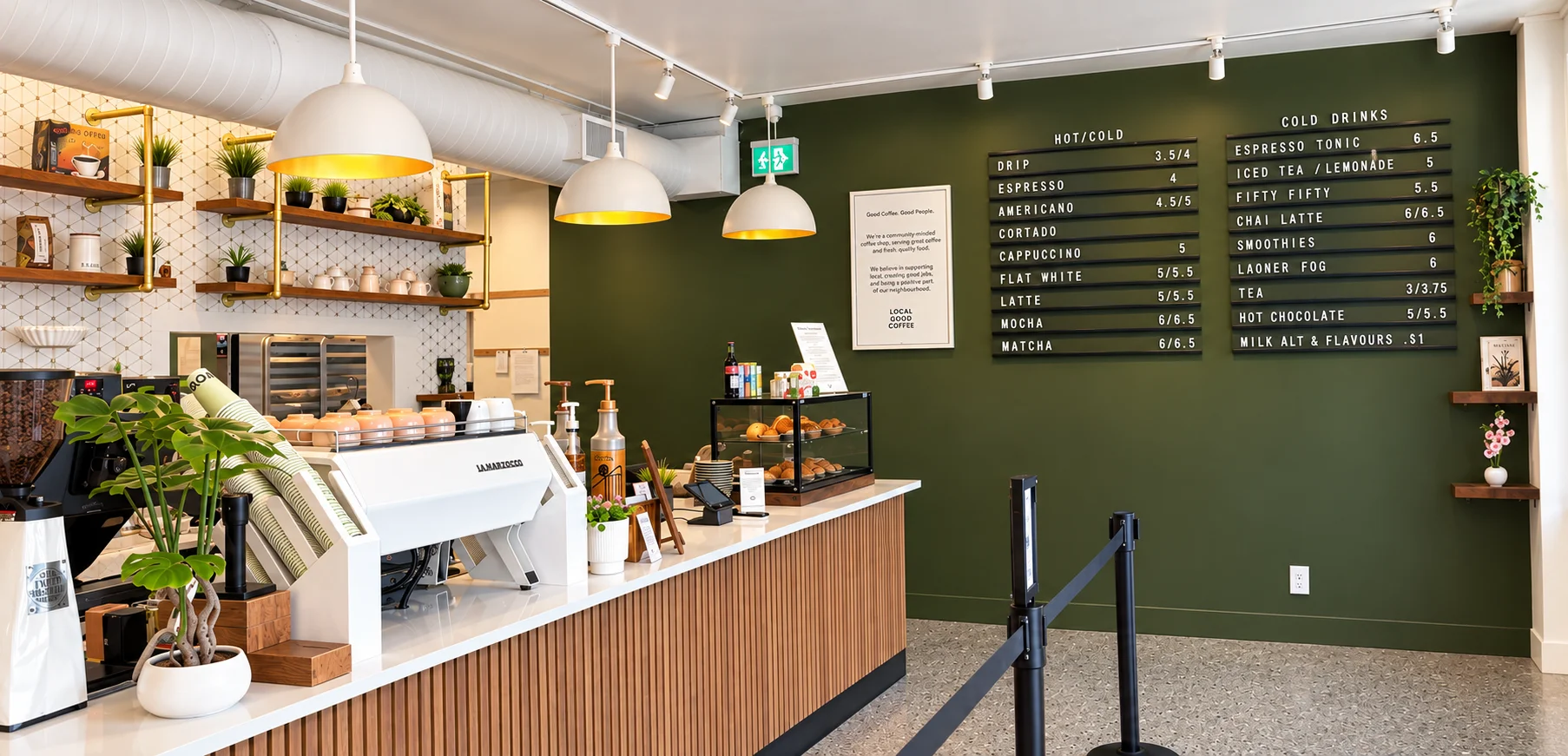 Modern coffee shop interior with espresso bar and menu boards