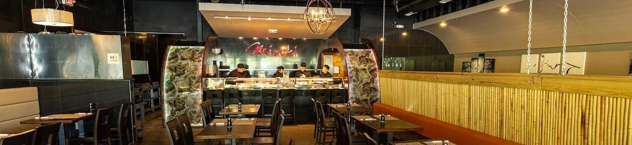 Delicious gourmet burger with fresh toppings on a wooden table
