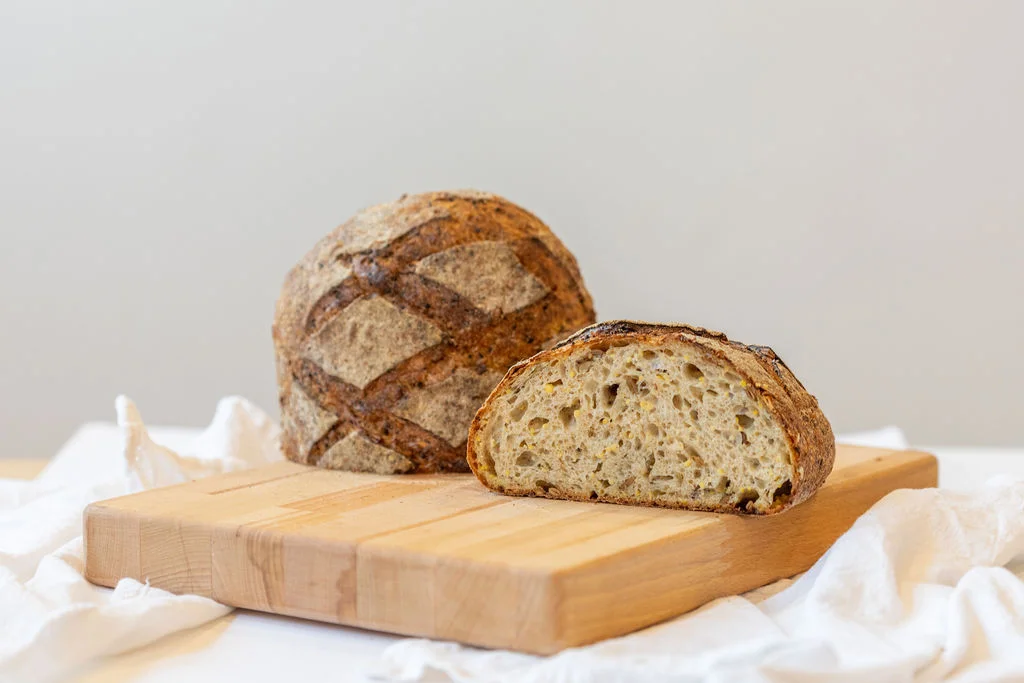 Sourdough bread sliced on a cutting board
