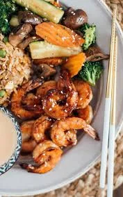 Grilled shrimp stir-fry with vegetables and rice