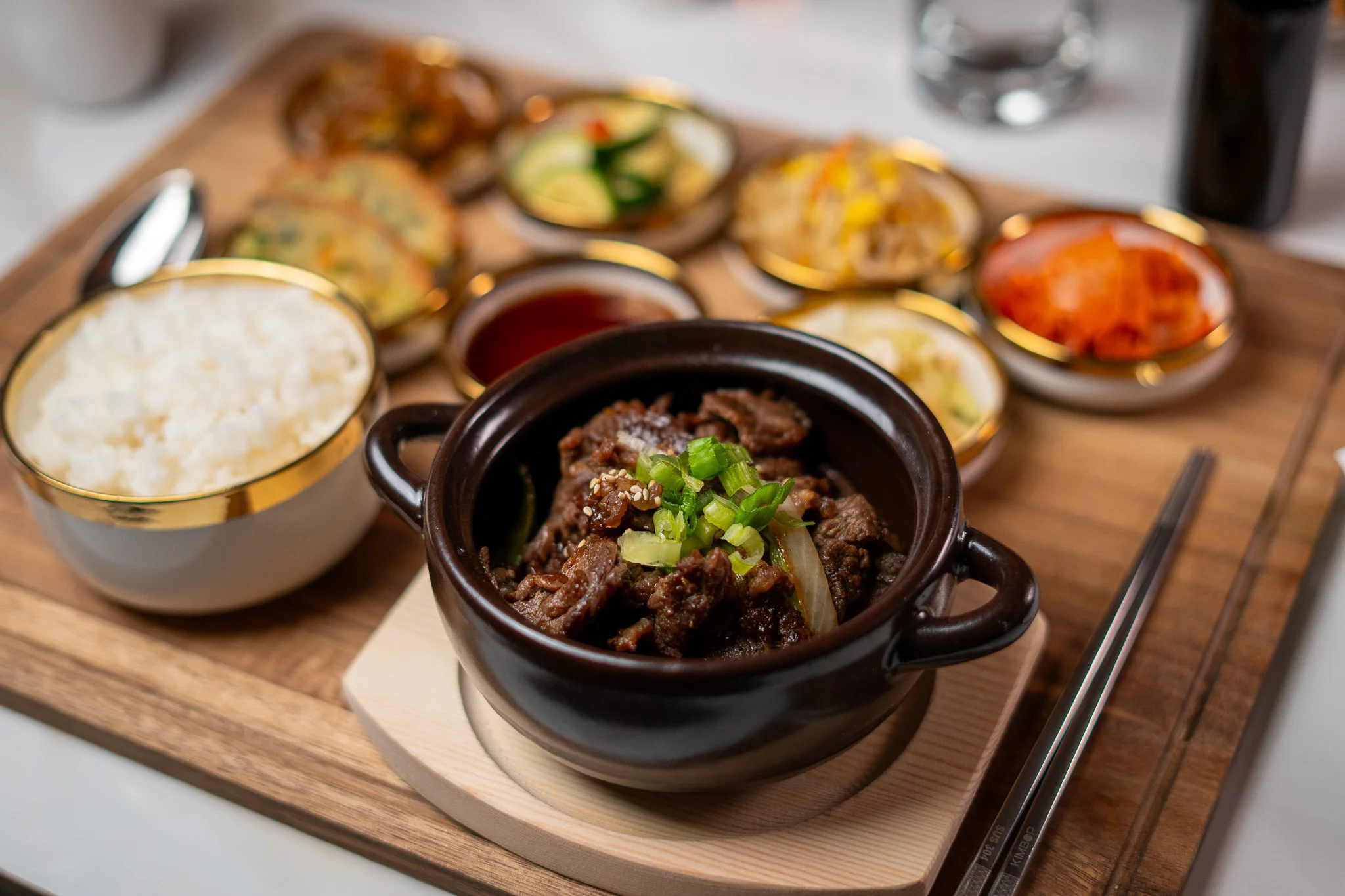 Korean bulgogi served with rice and banchan