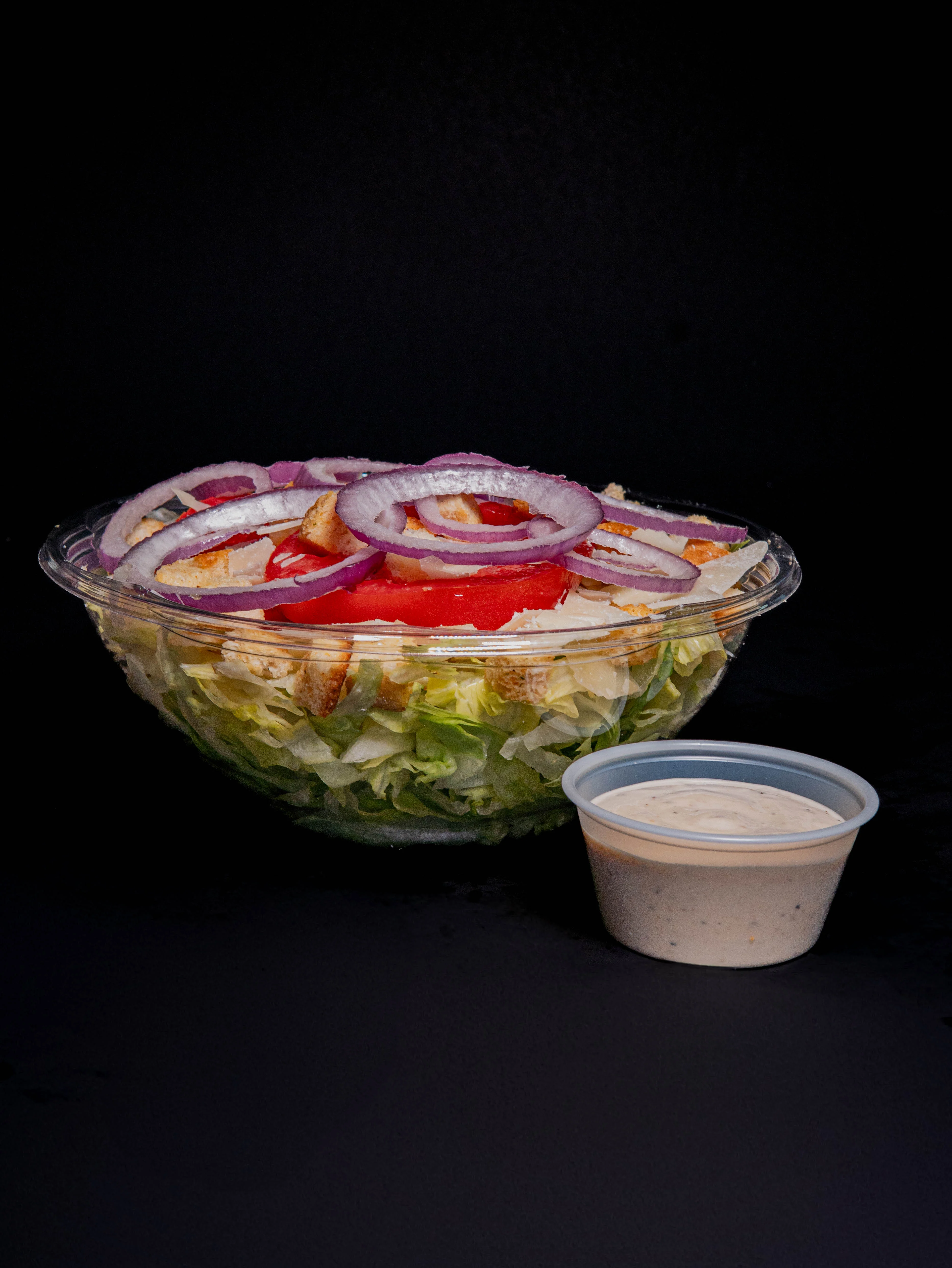 Fresh garden salad with creamy dressing