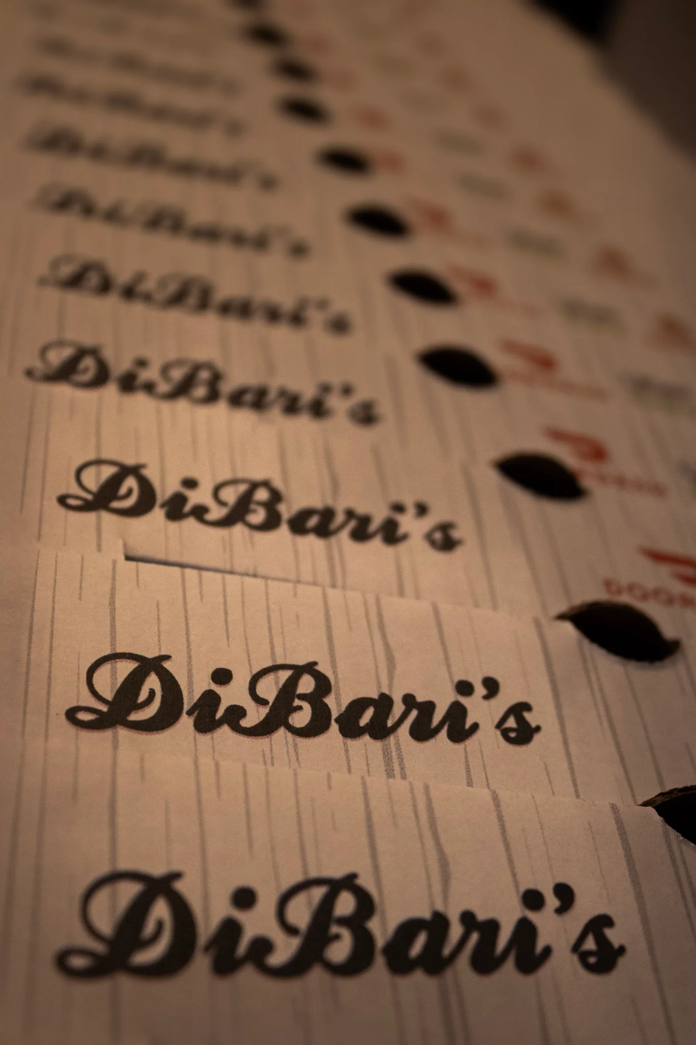 Elegant restaurant menu design featuring DiBari's logo