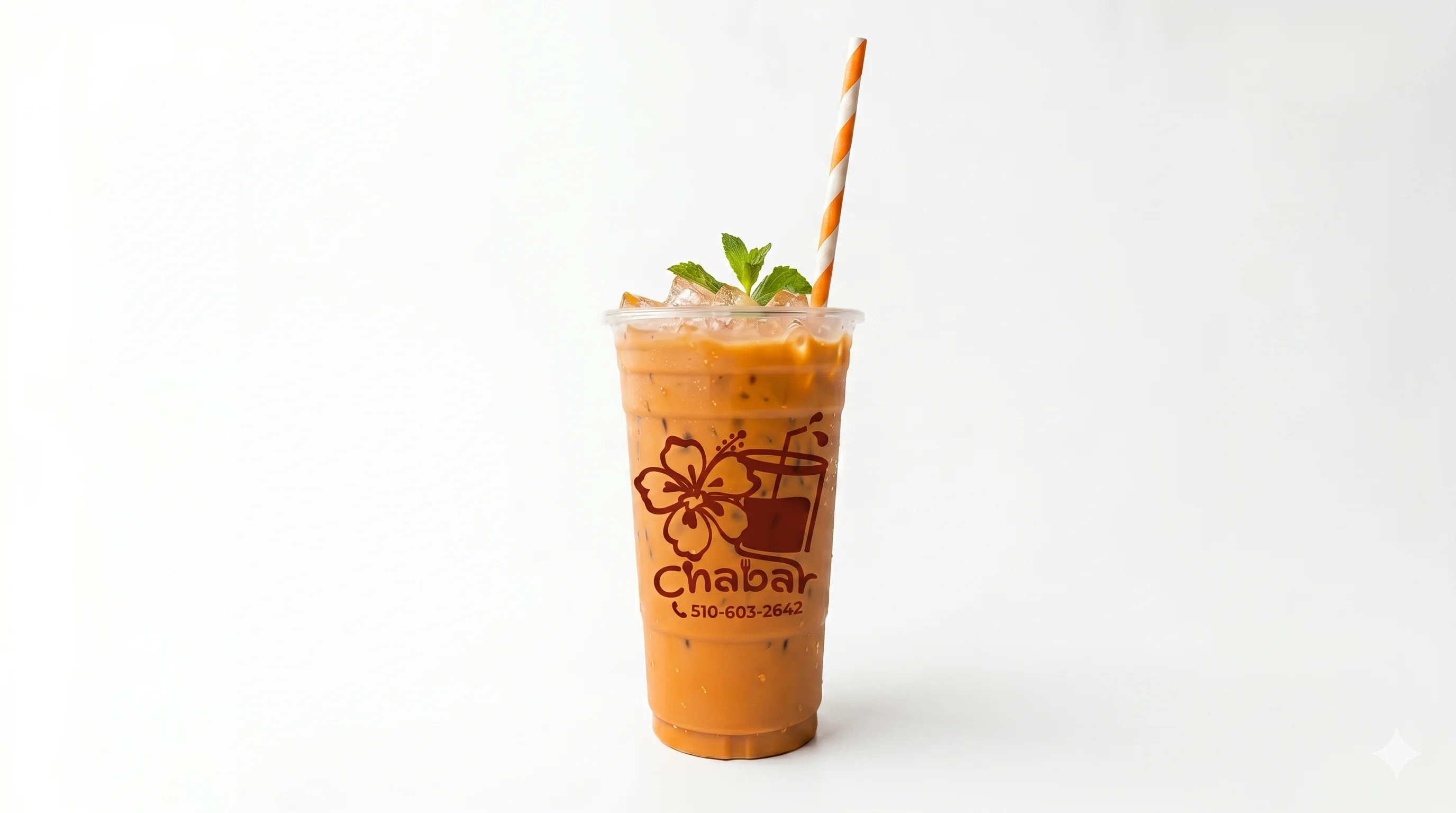 Iced tea drink with mint garnish in a clear cup
