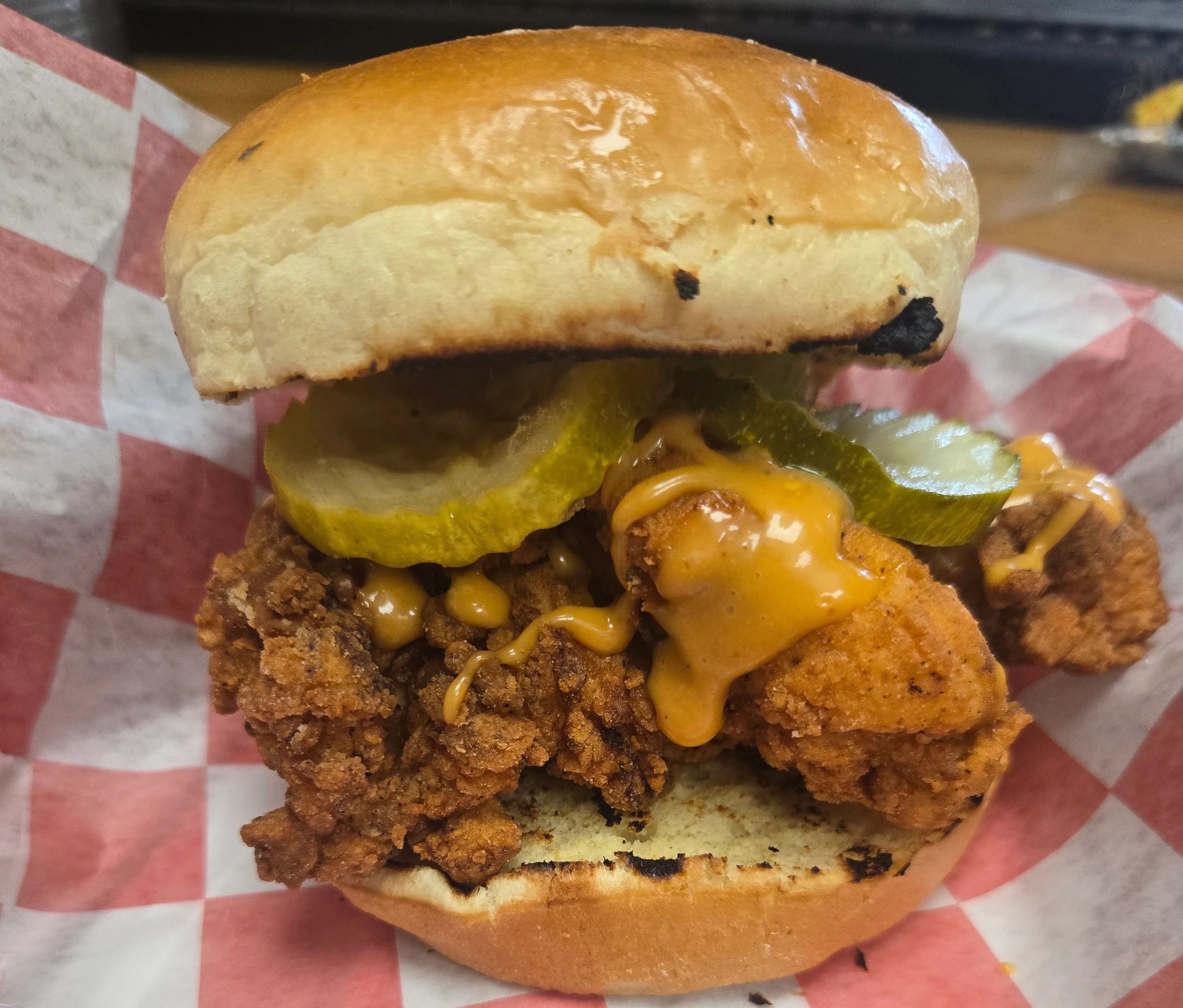 American fried chicken sandwich with pickles and sauce