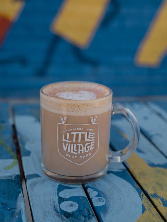 fall fog latte on a blue picnic table