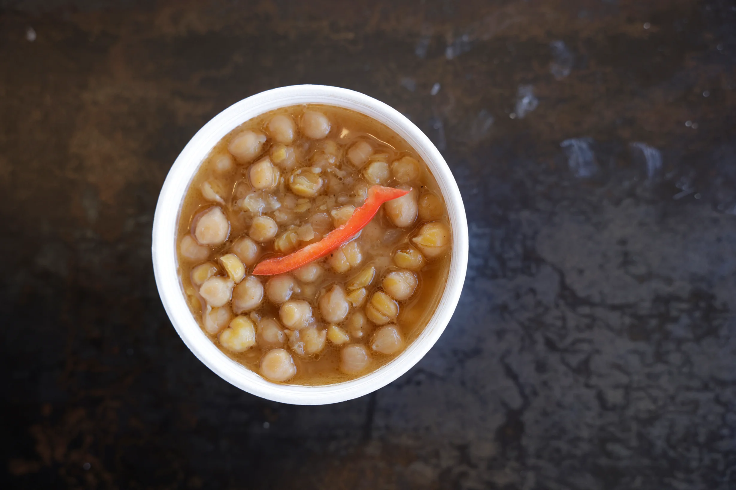 Bowl of Indian chana dal with spices and chili