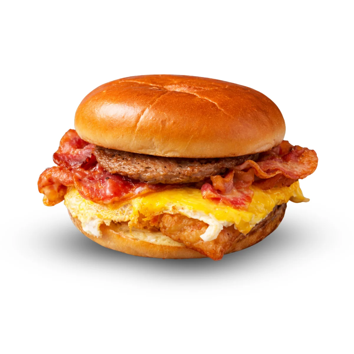 Wagyu Burger – wagyu patty with egg and cheese on a bun, served plated
