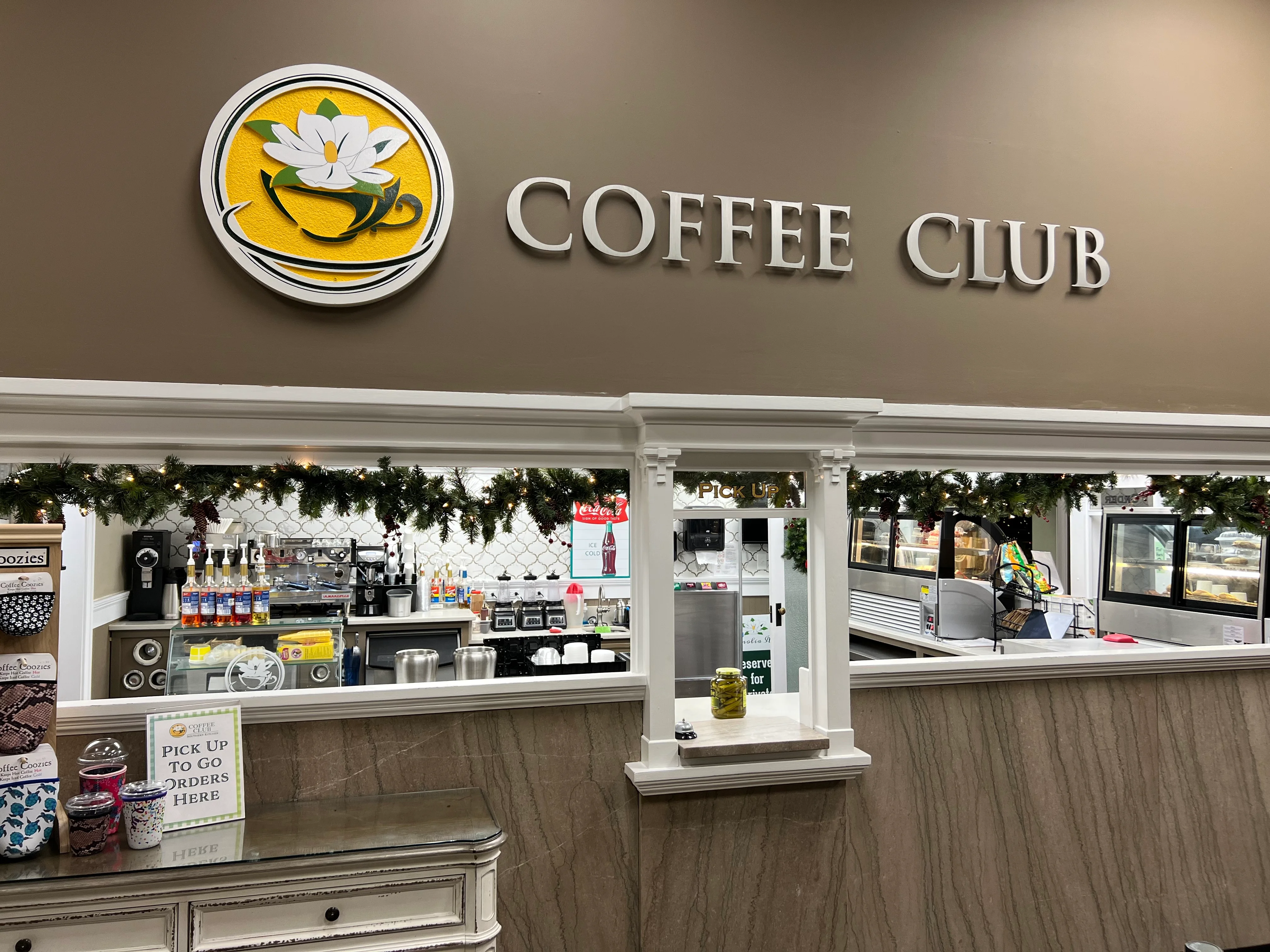 Coffee Club interior with a welcoming atmosphere and festive decor
