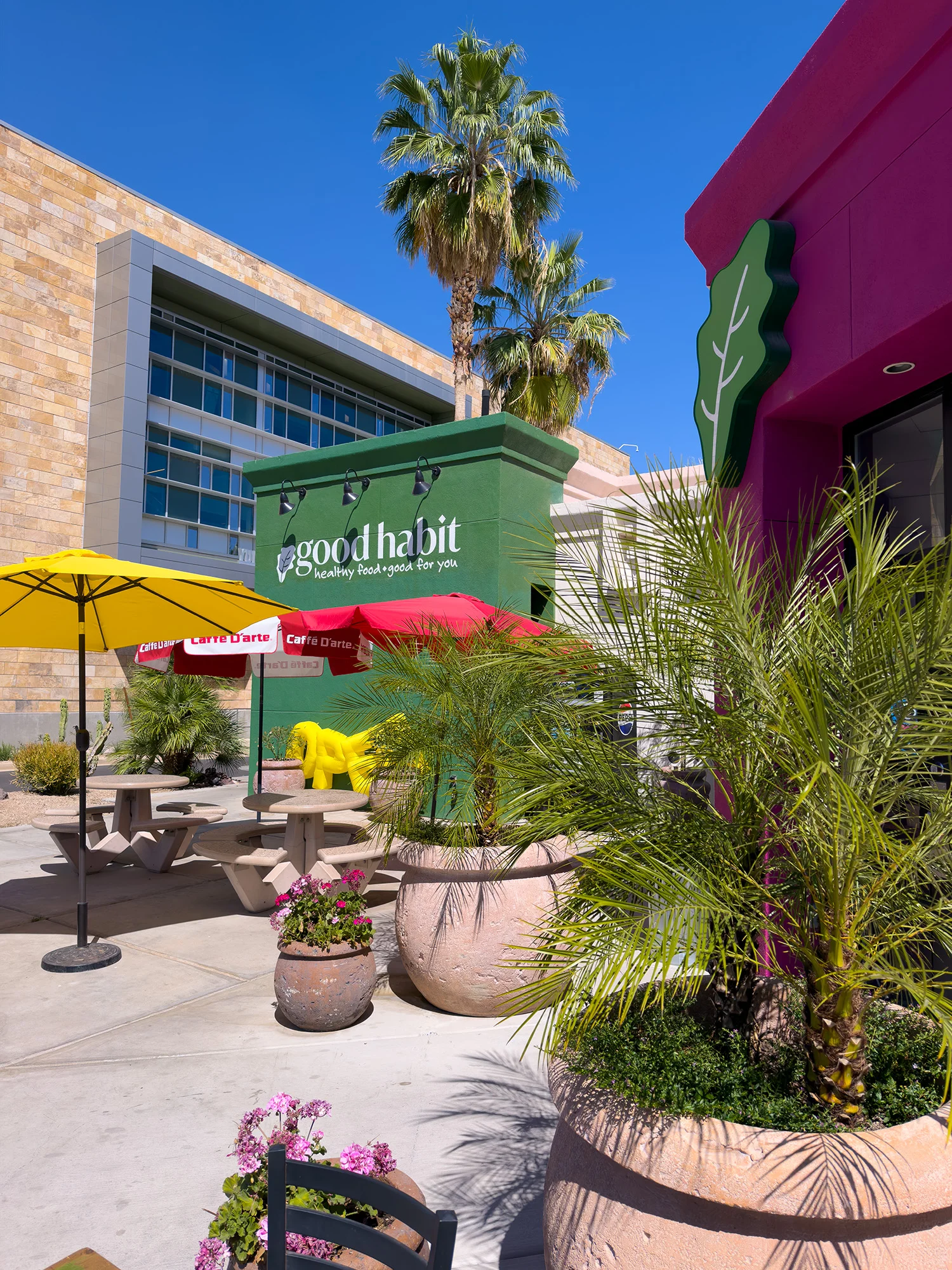 Outdoor dining area of a healthy restaurant with vibrant decor