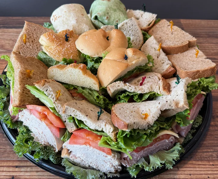 Catering platter with assorted deli sandwich wedges