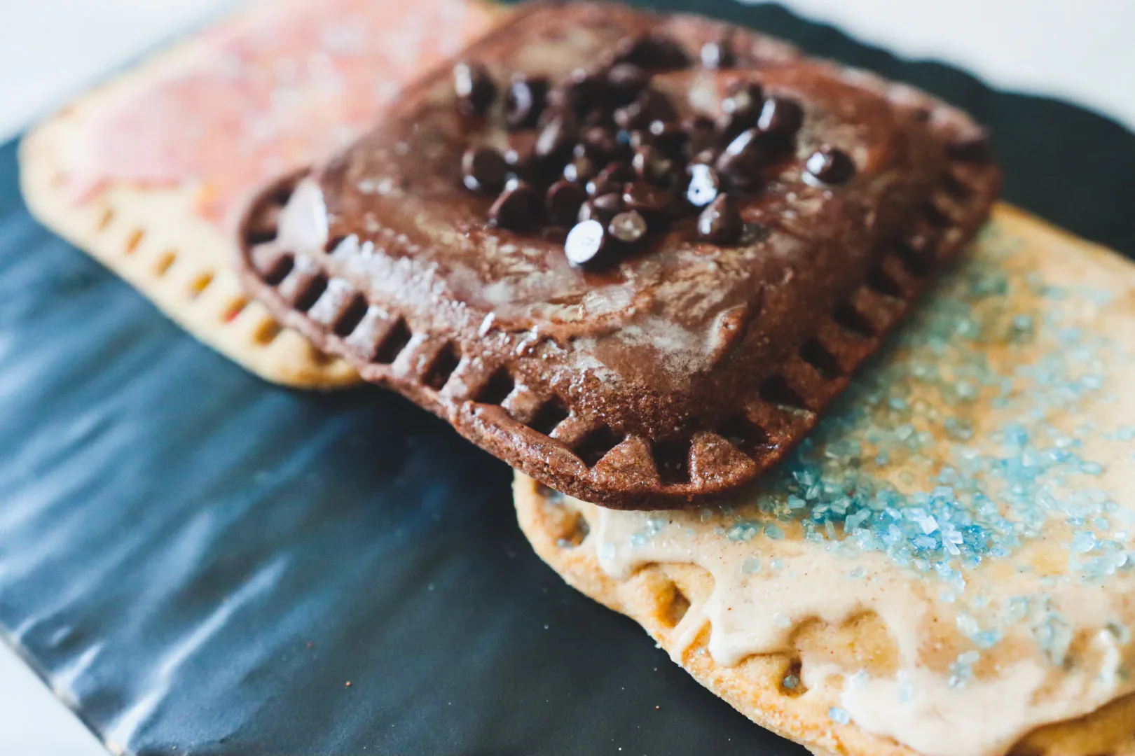 Colorful pop tarts with chocolate and sprinkles
