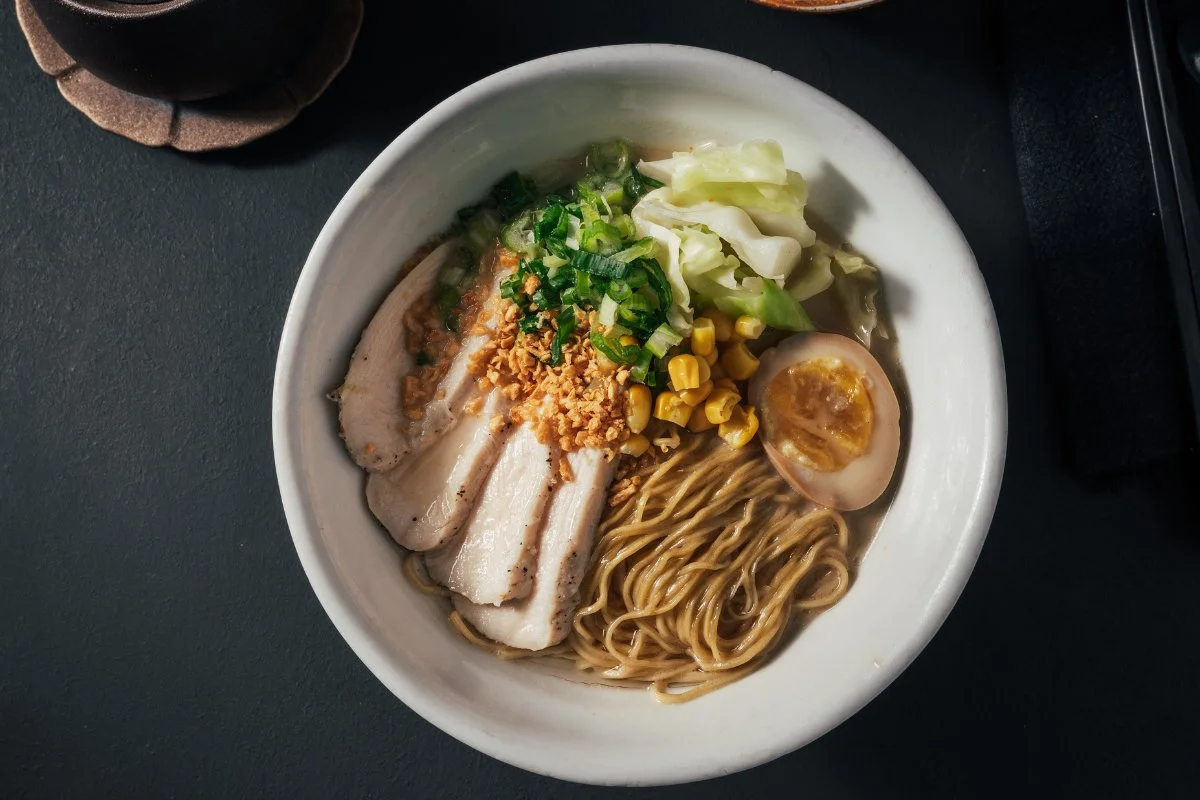 Delicious Chicken Paitan Ramen served in a bowl with toppings.