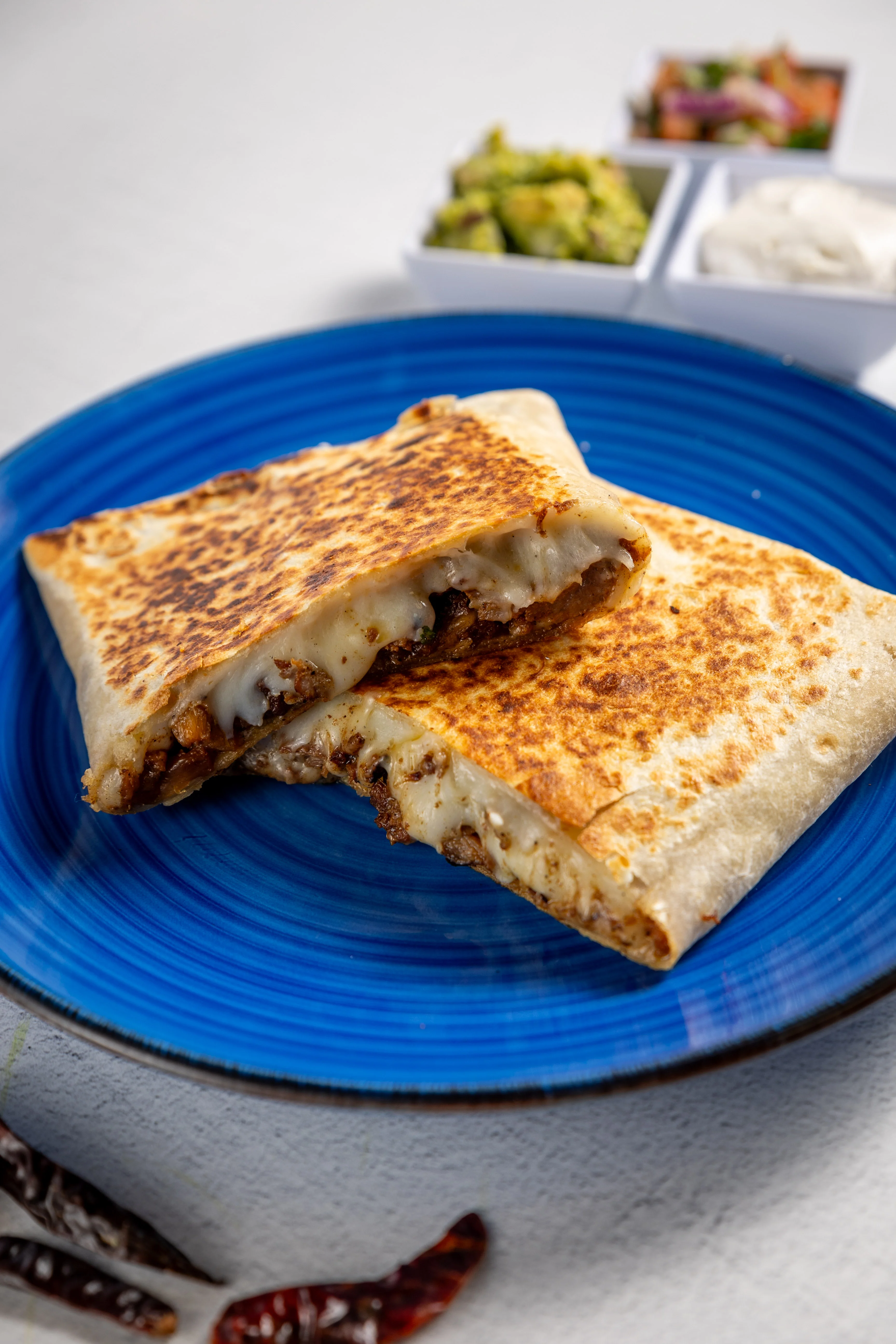 Crispy quesadilla with melted cheese and savory filling