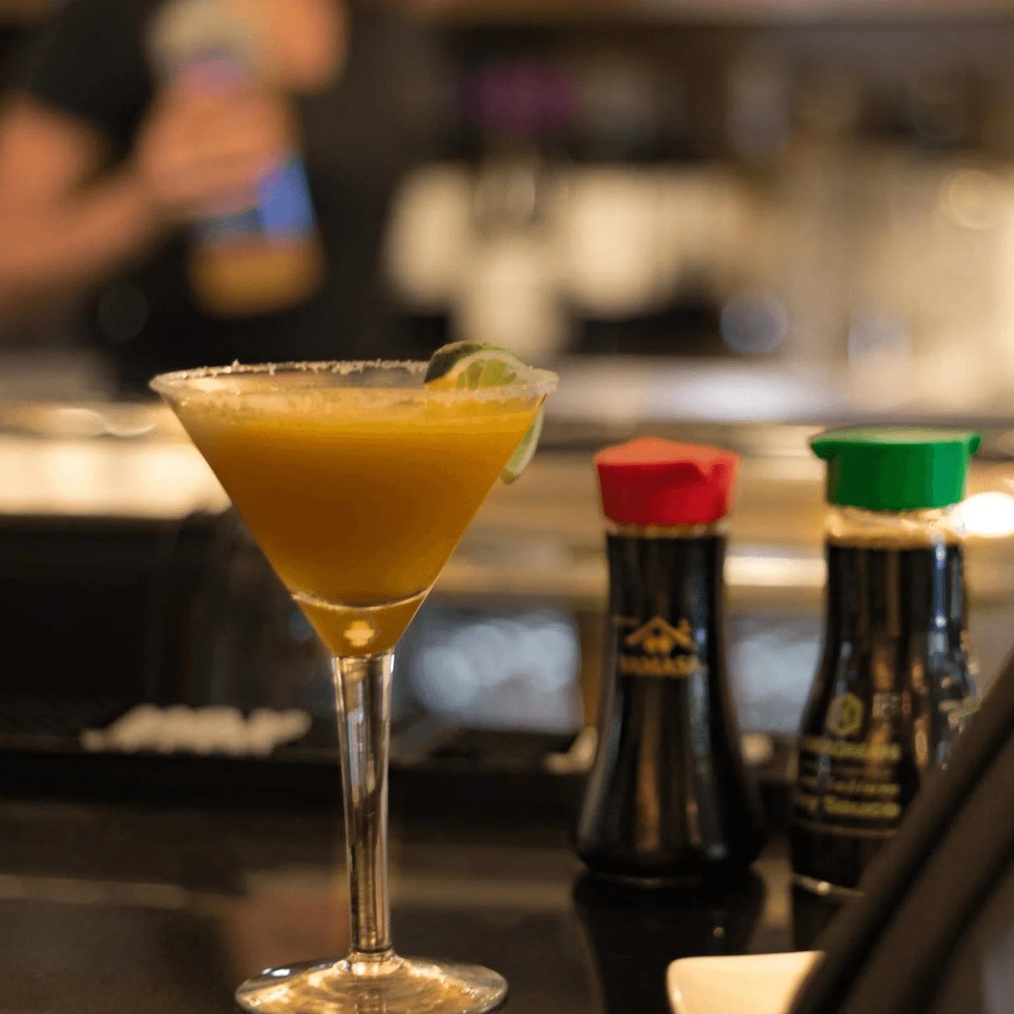 Colorful margarita cocktail with lime garnish