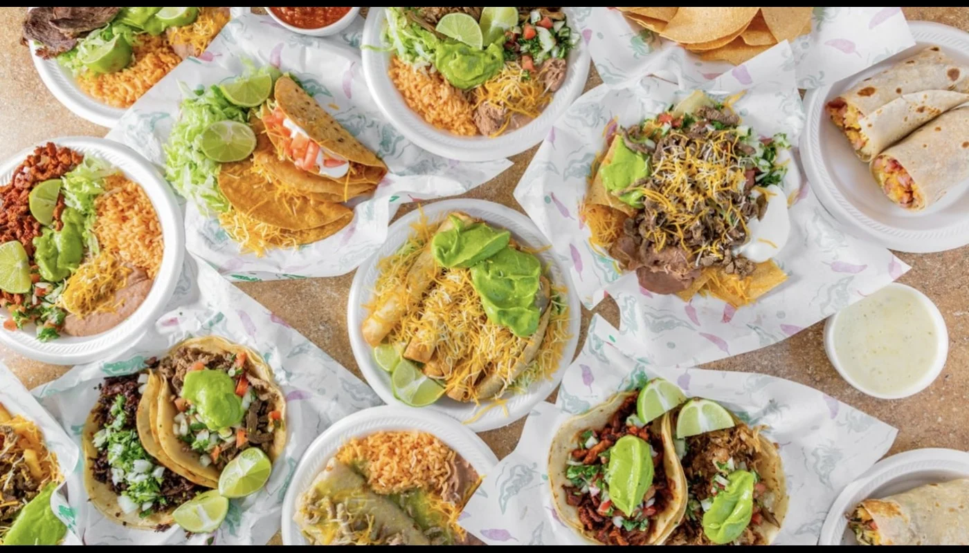 Assorted Mexican tacos and nachos with toppings