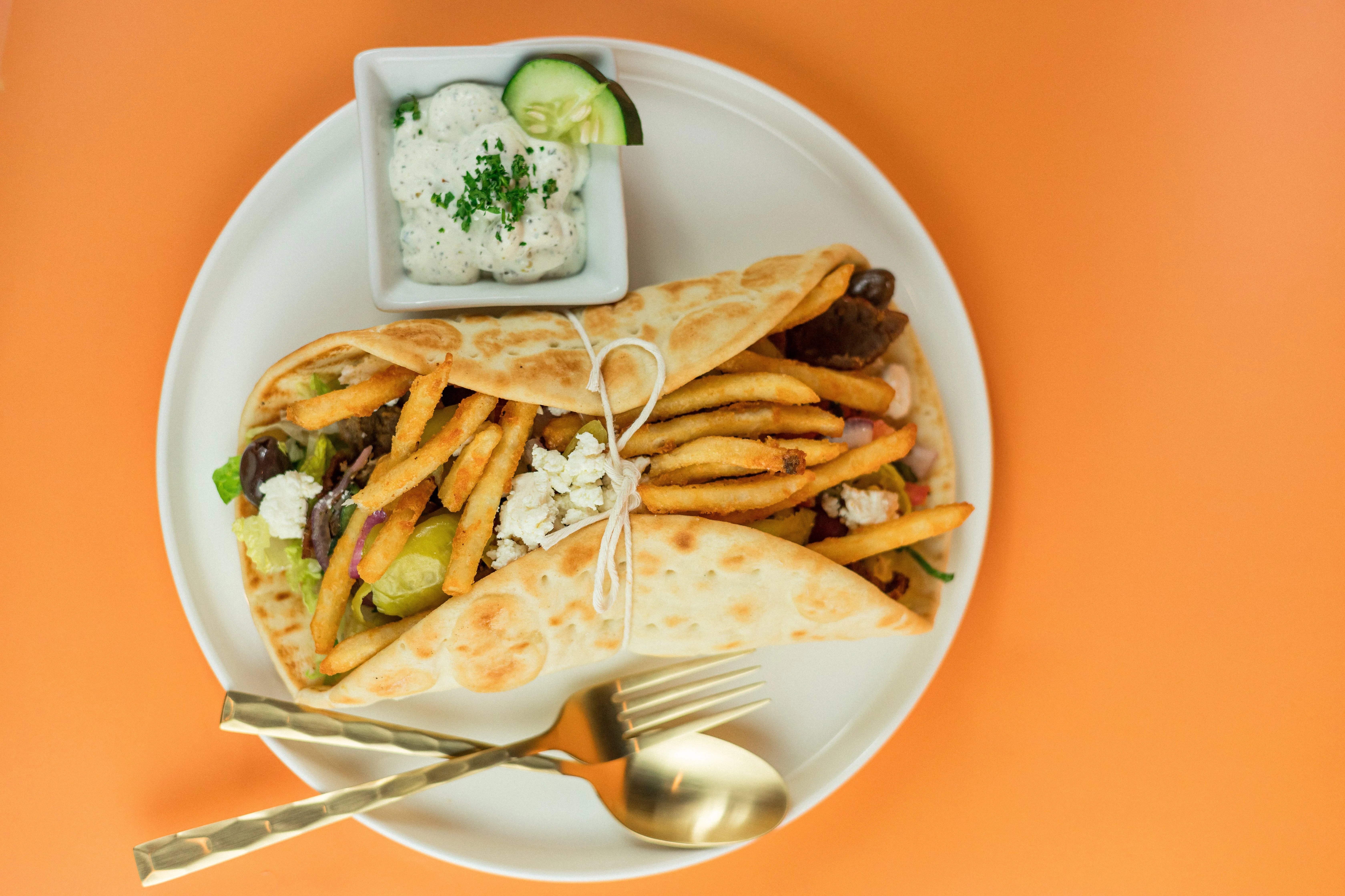 Original Greek pita with house fries and tzatziki at Santorini's Greek Grill in Riverton Utah