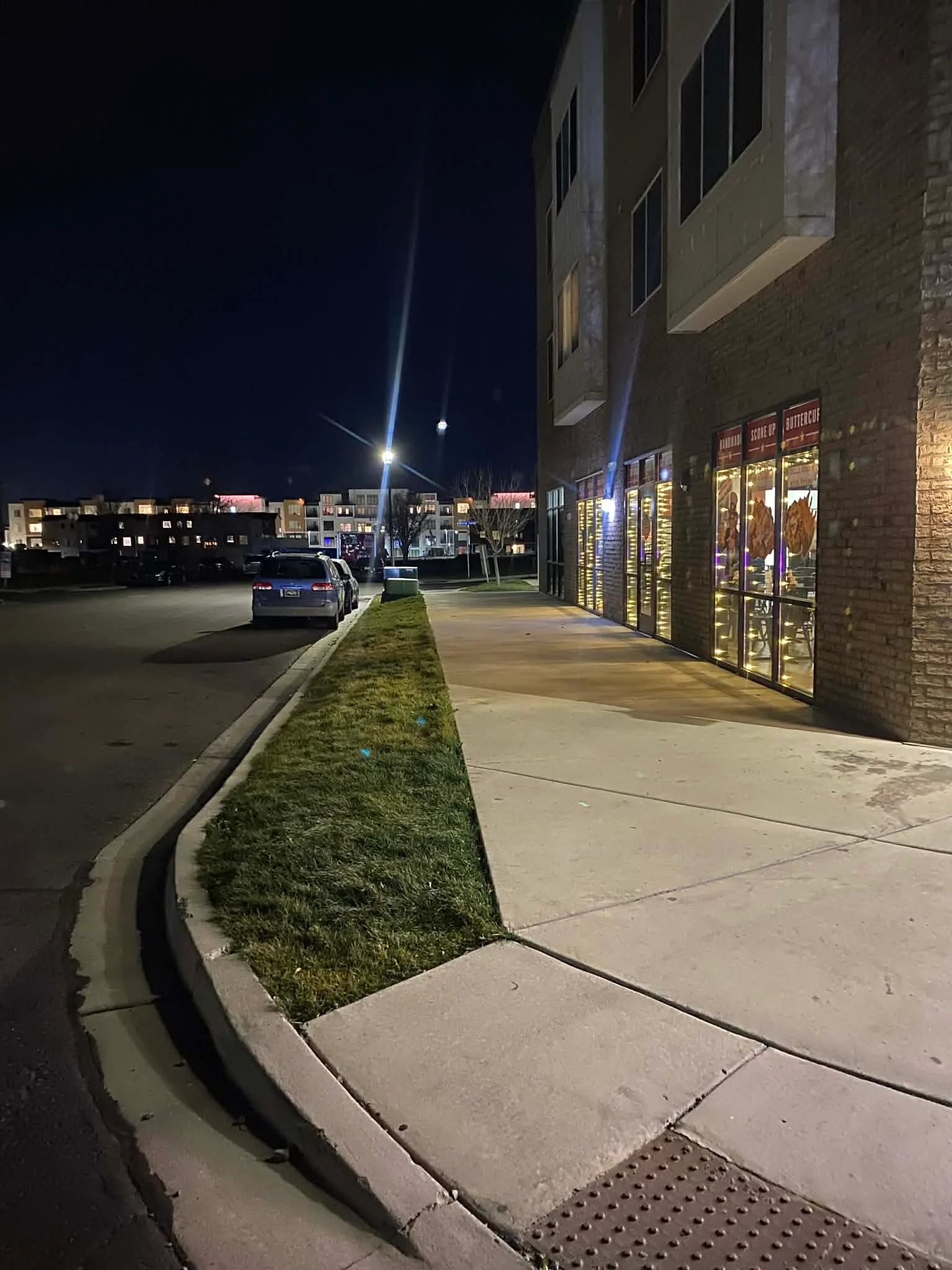 Night view of a restaurant exterior with warm lighting