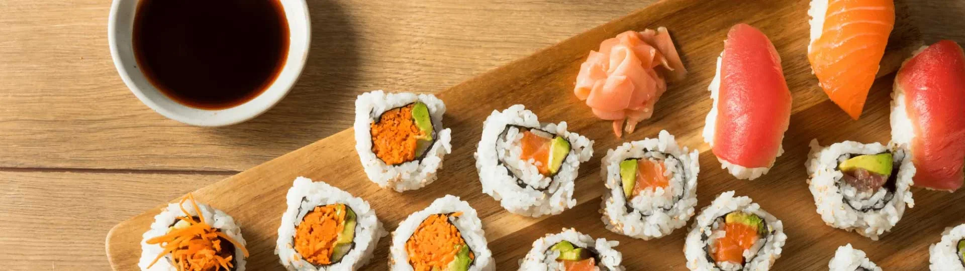 Assorted sushi platter featuring nigiri and maki rolls