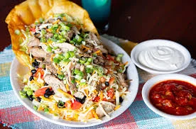Loaded Mexican taco salad in a crispy shell