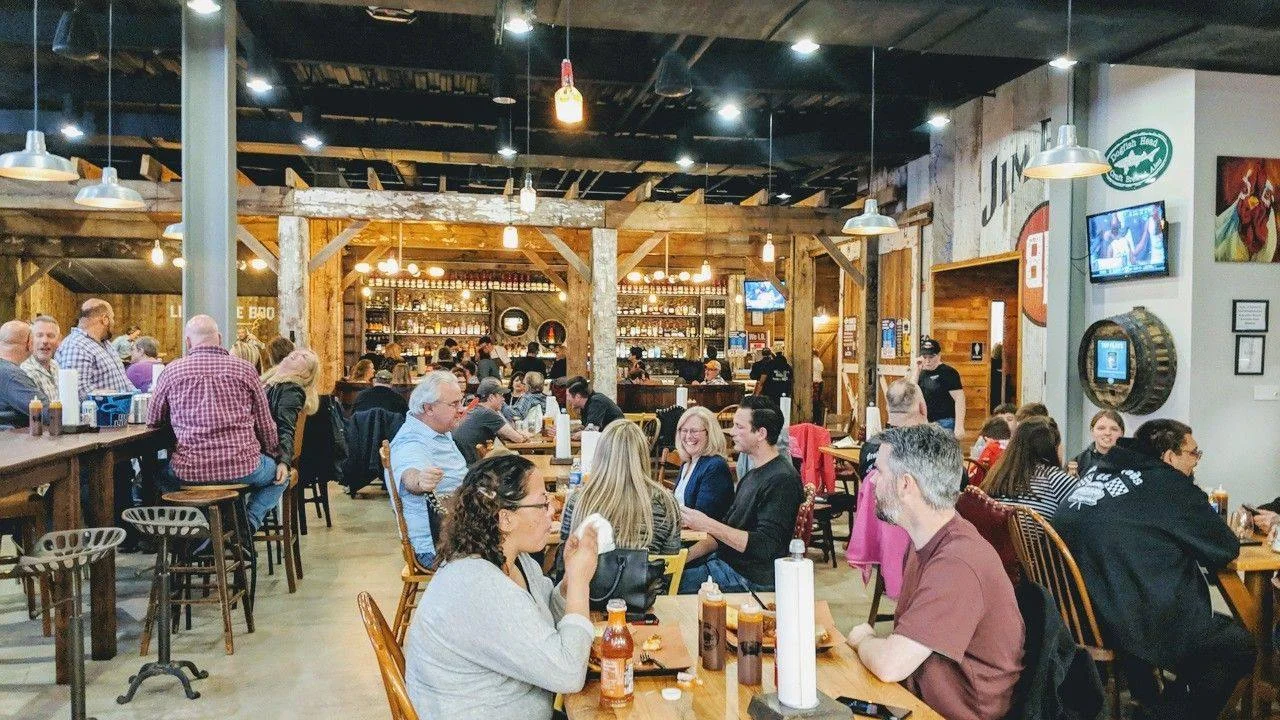 Cozy restaurant interior with rustic decor and lively dining atmosphere