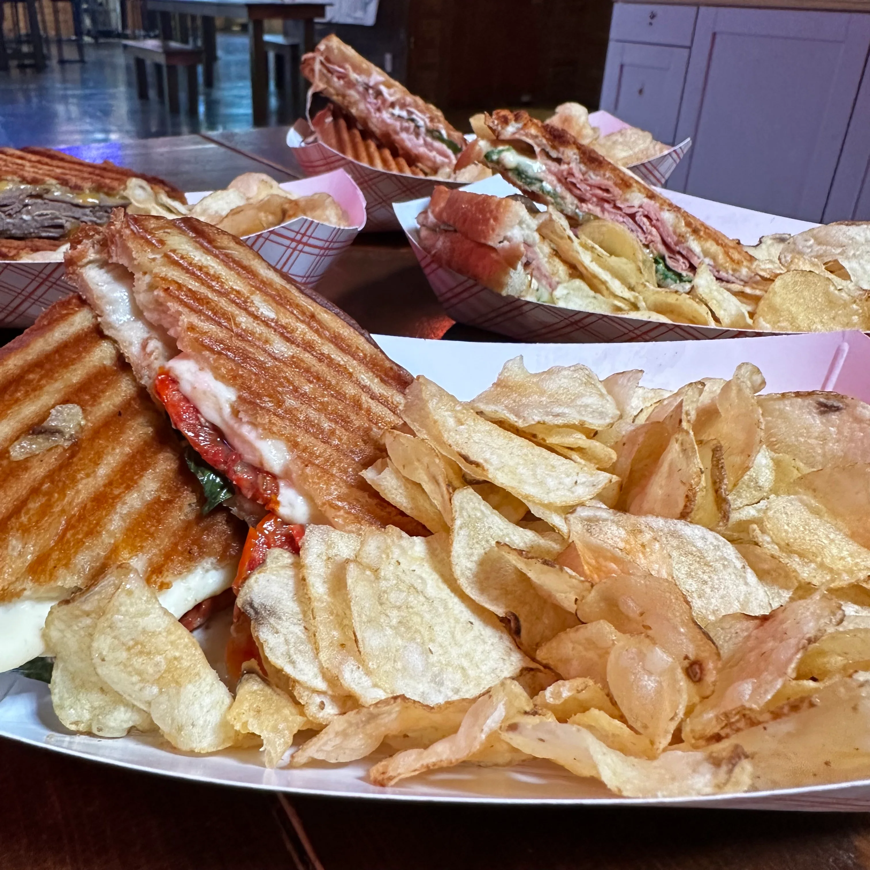 Grilled panini sandwich with chips
