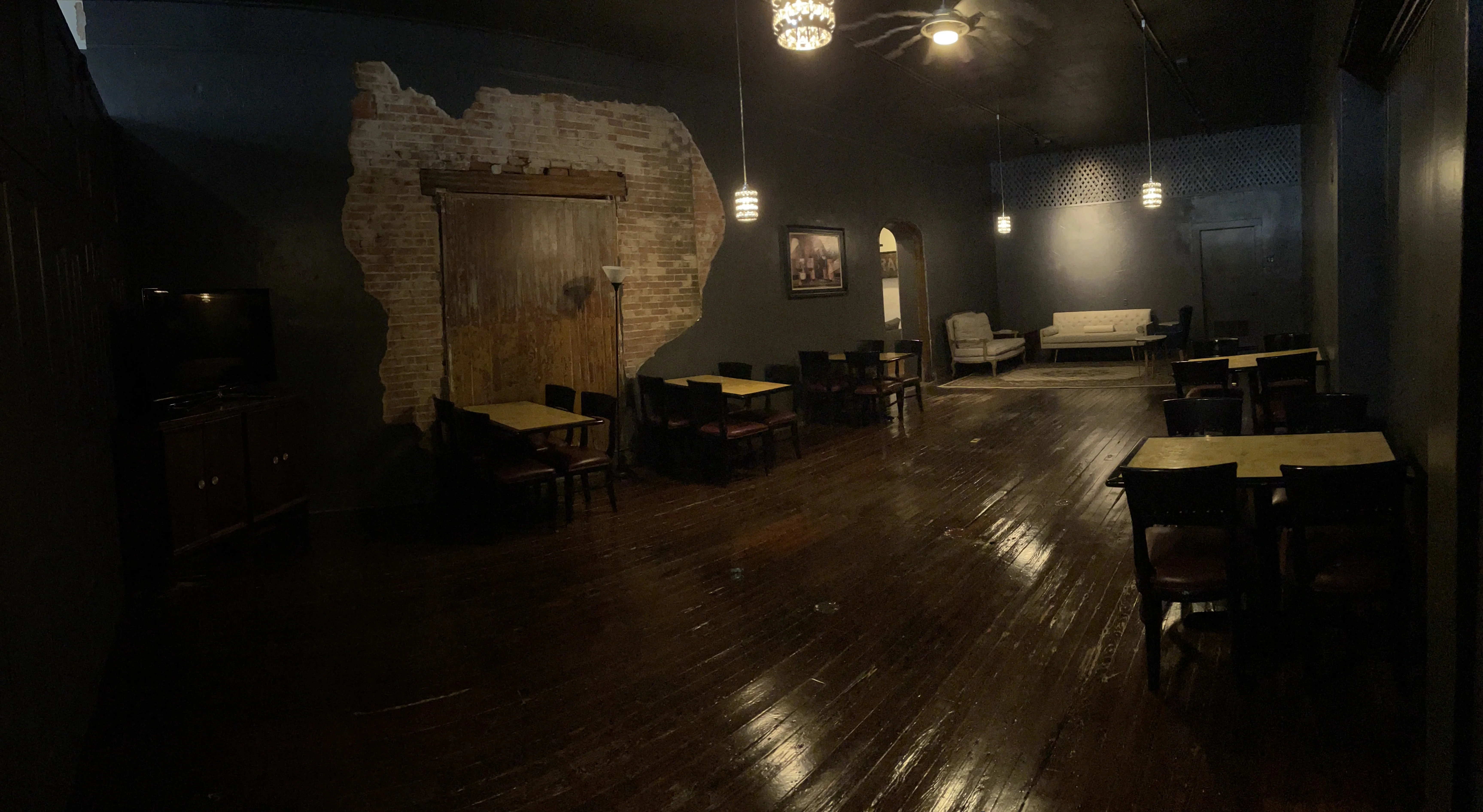 Cozy restaurant interior with rustic charm and warm lighting