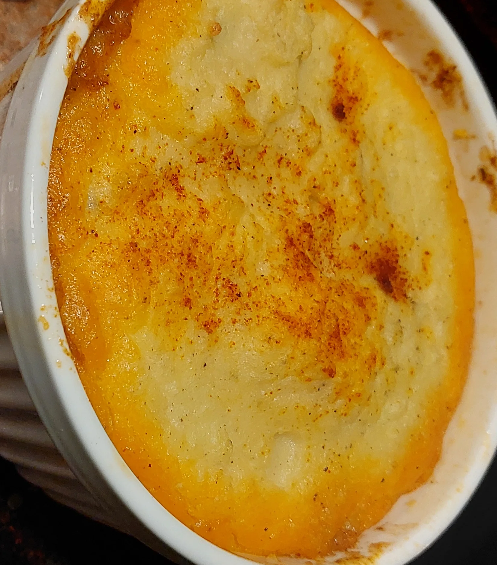 Shepherd's pie baked in a ramekin with golden crust