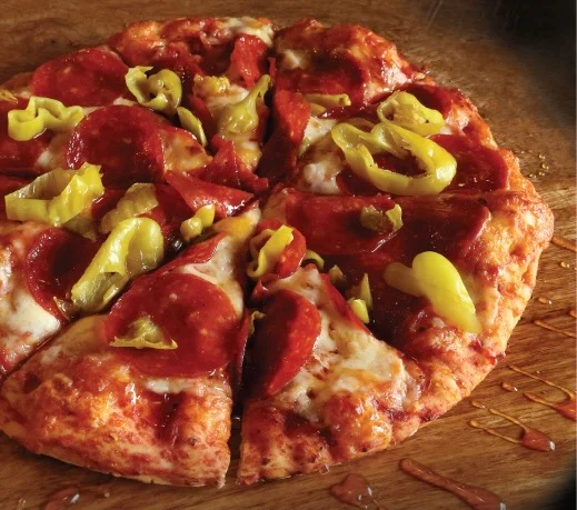 Pepperoni pizza topped with banana peppers