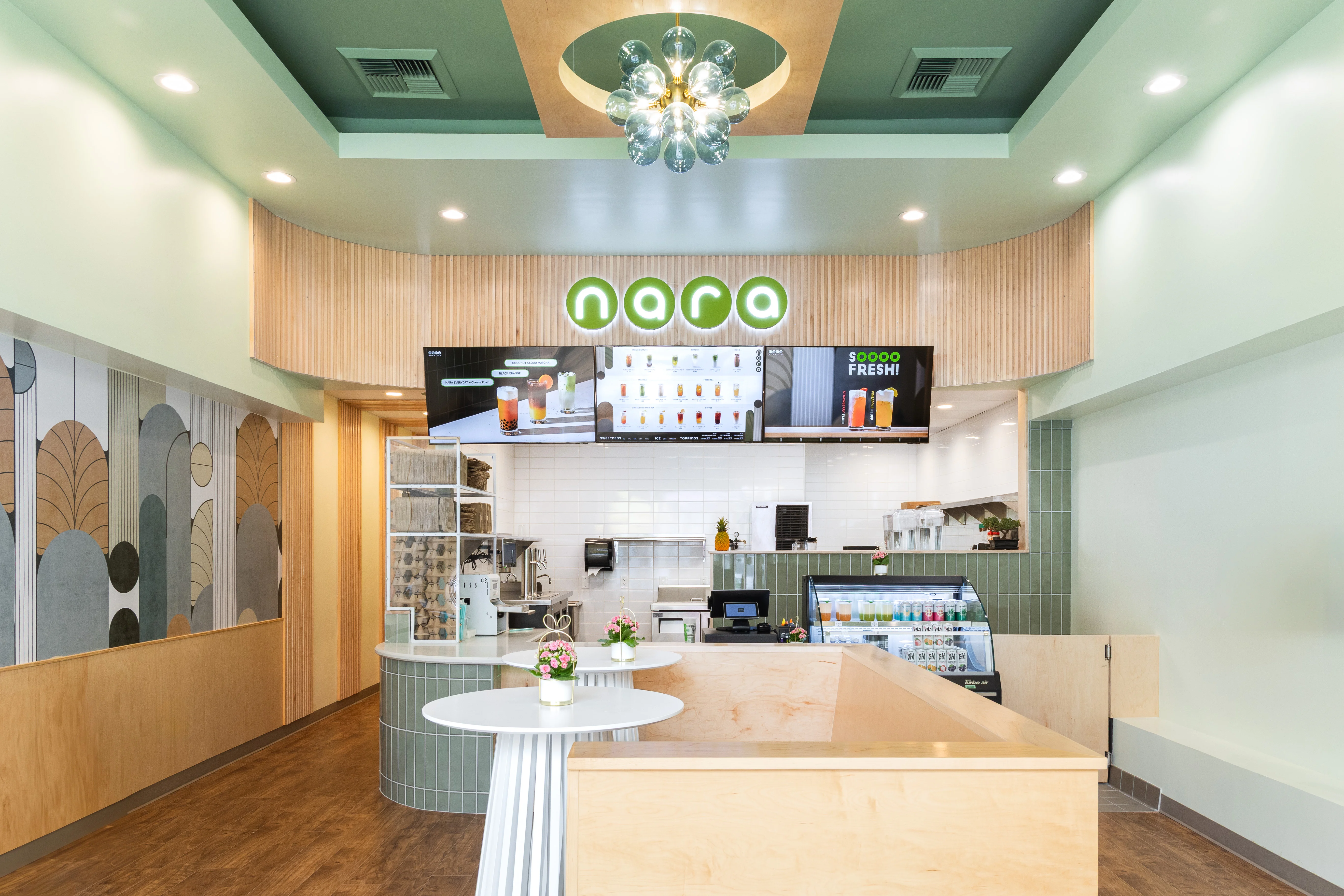Modern cafe interior with vibrant decor and beverage displays