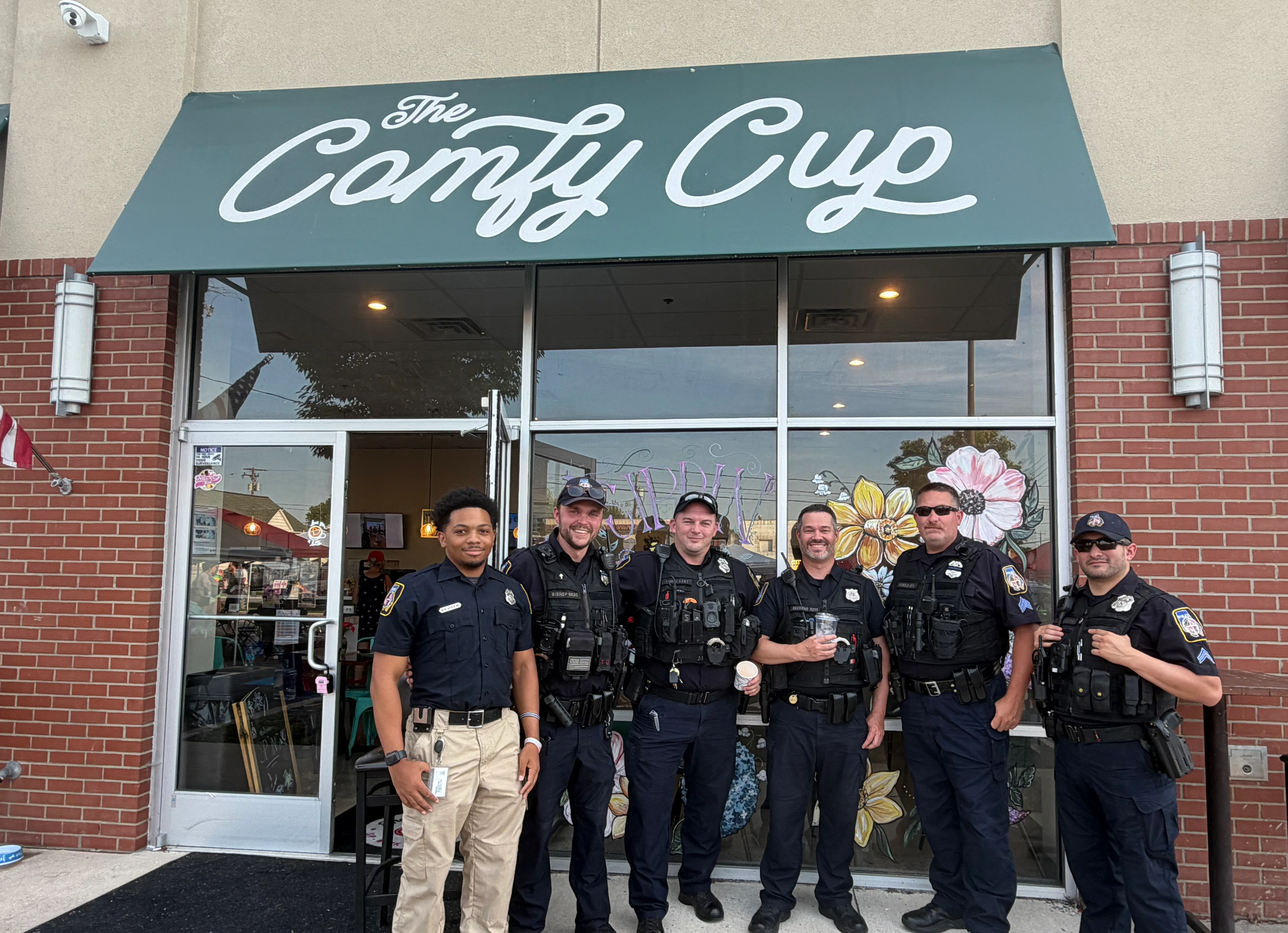 Local police offers enjoying coffee at The Comfy Cup