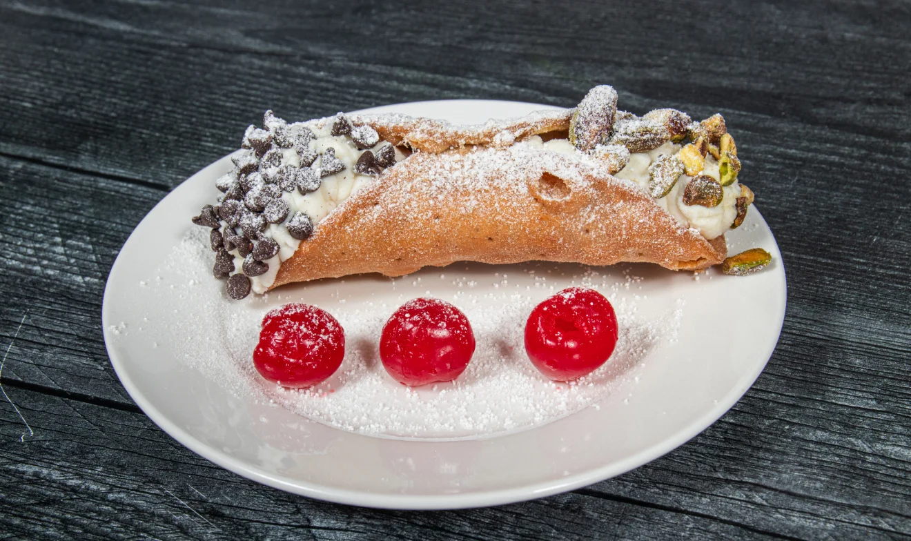 Delicious cannoli dessert with creamy filling and chocolate chips