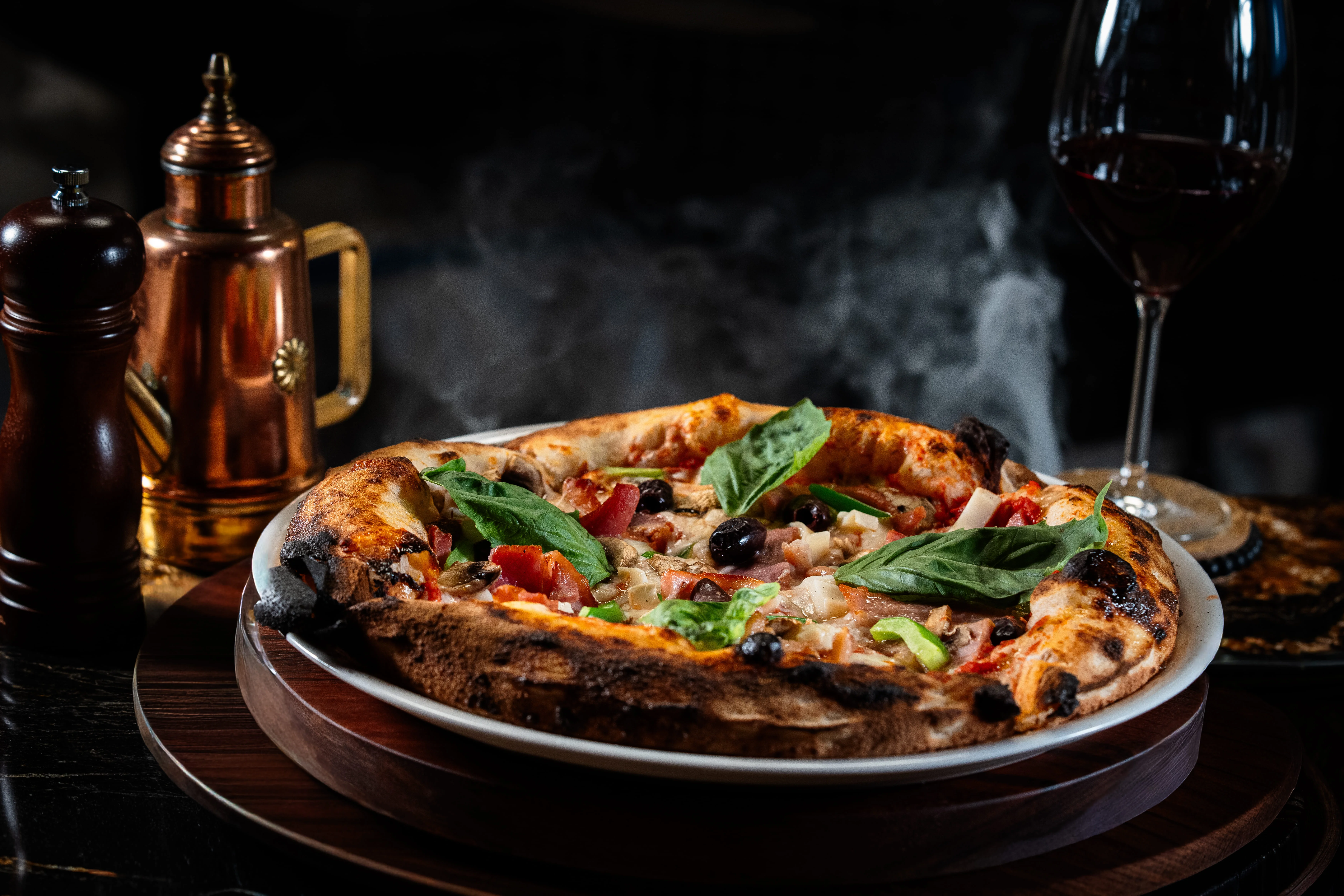 Wood-fired Margherita pizza with fresh basil