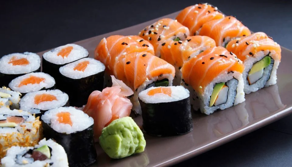 Assorted Japanese sushi platter with salmon and avocado rolls