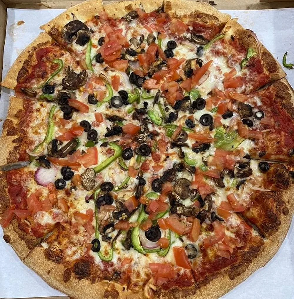 Vegetarian pizza with fresh toppings and a crispy crust