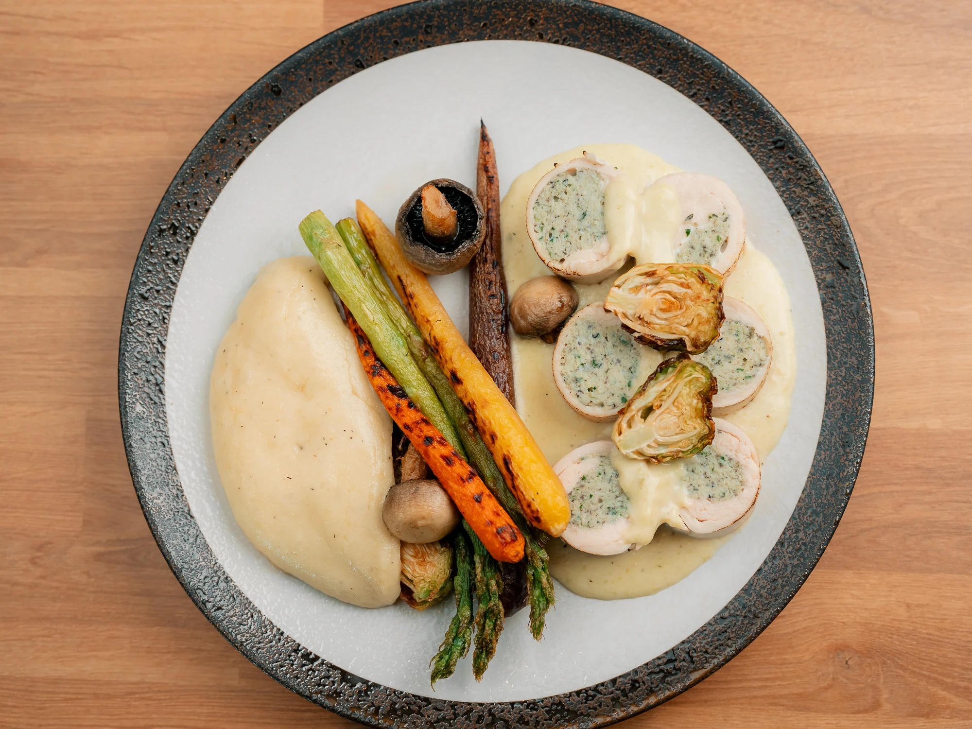 French chicken roulade with seasonal vegetables