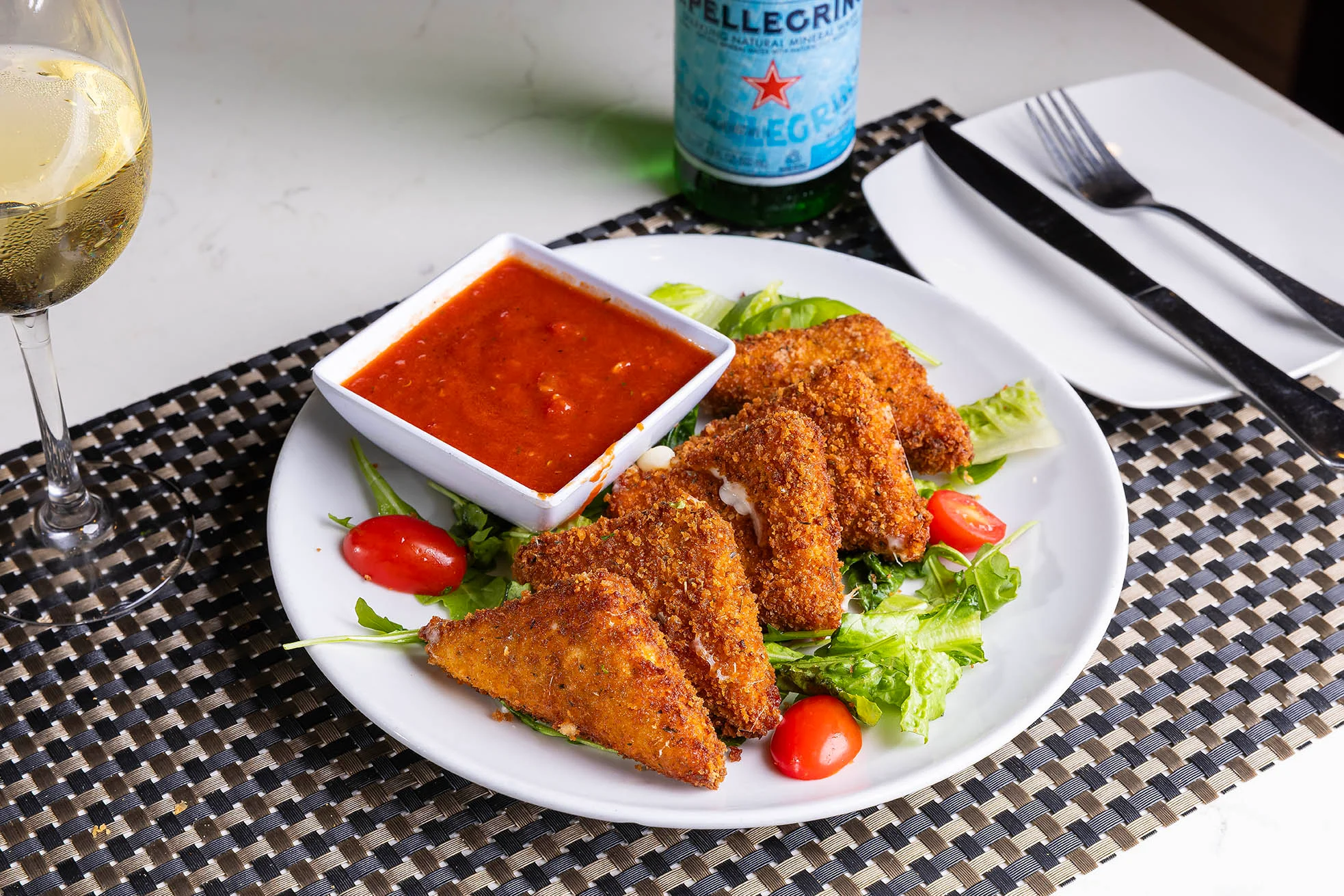 fresh mozzarella sticks with homemade marinara sauce 