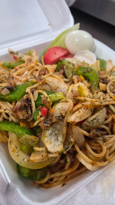 Delicious plate of Chinese chow mein with vegetables and meat
