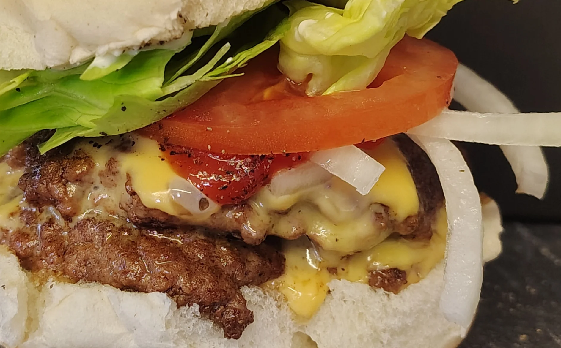 Classic American cheeseburger with fresh toppings