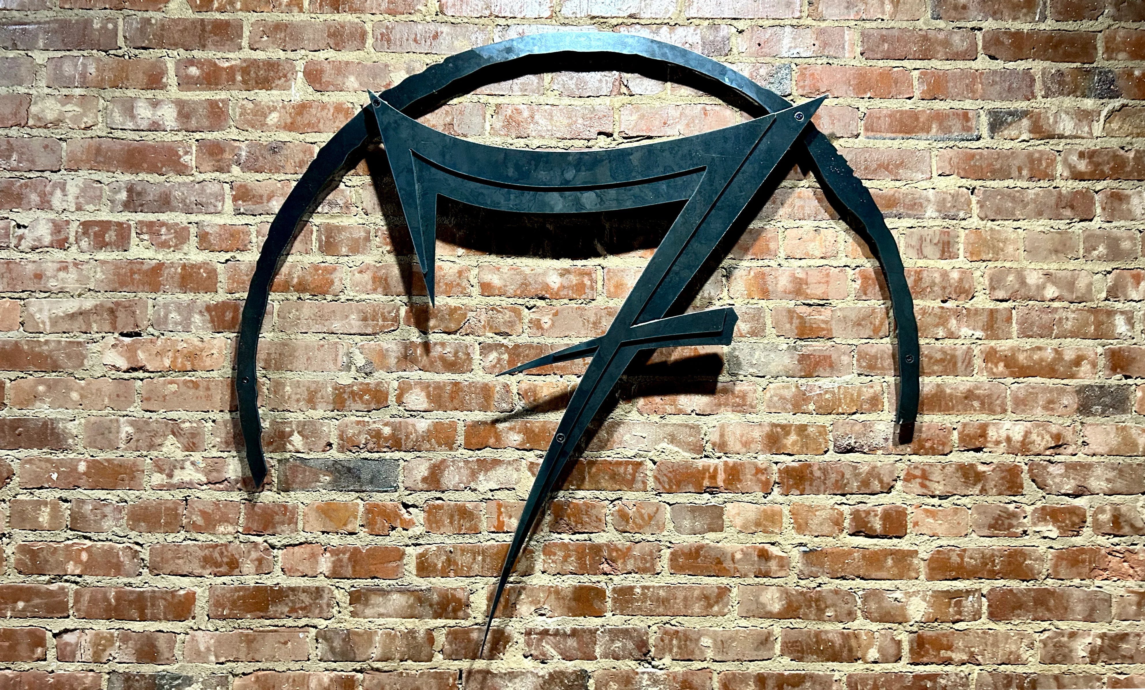 Stylish restaurant logo on exposed brick wall