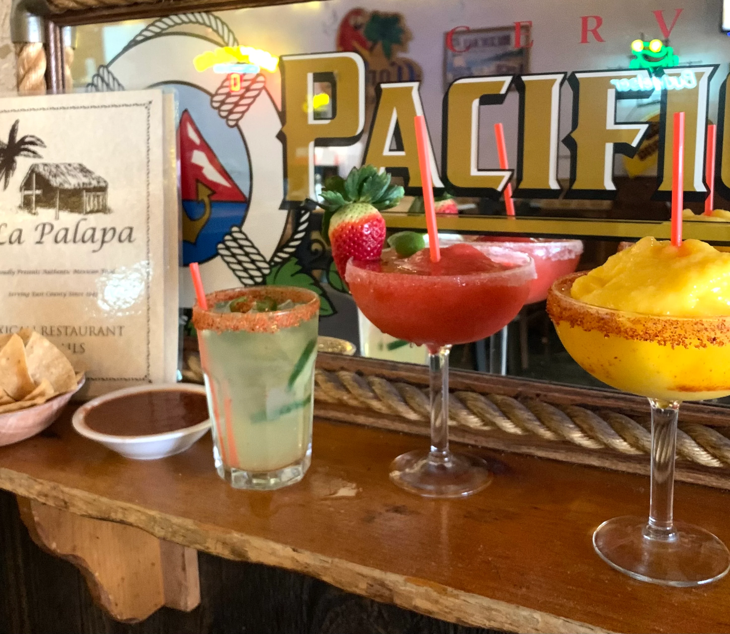 Colorful margaritas and chips at a Mexican restaurant