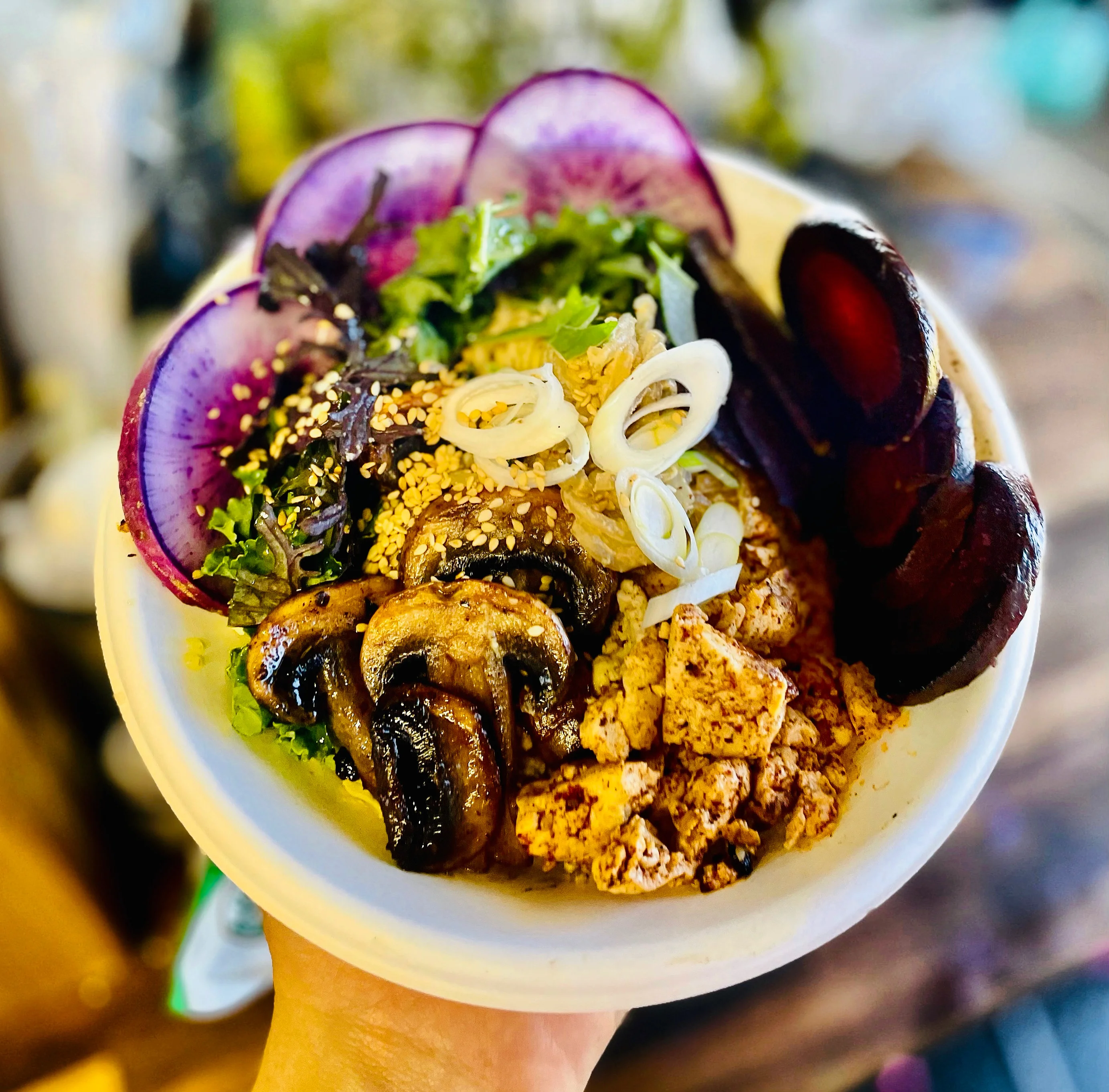 Colorful Korean bibimbap with assorted vegetables and tofu