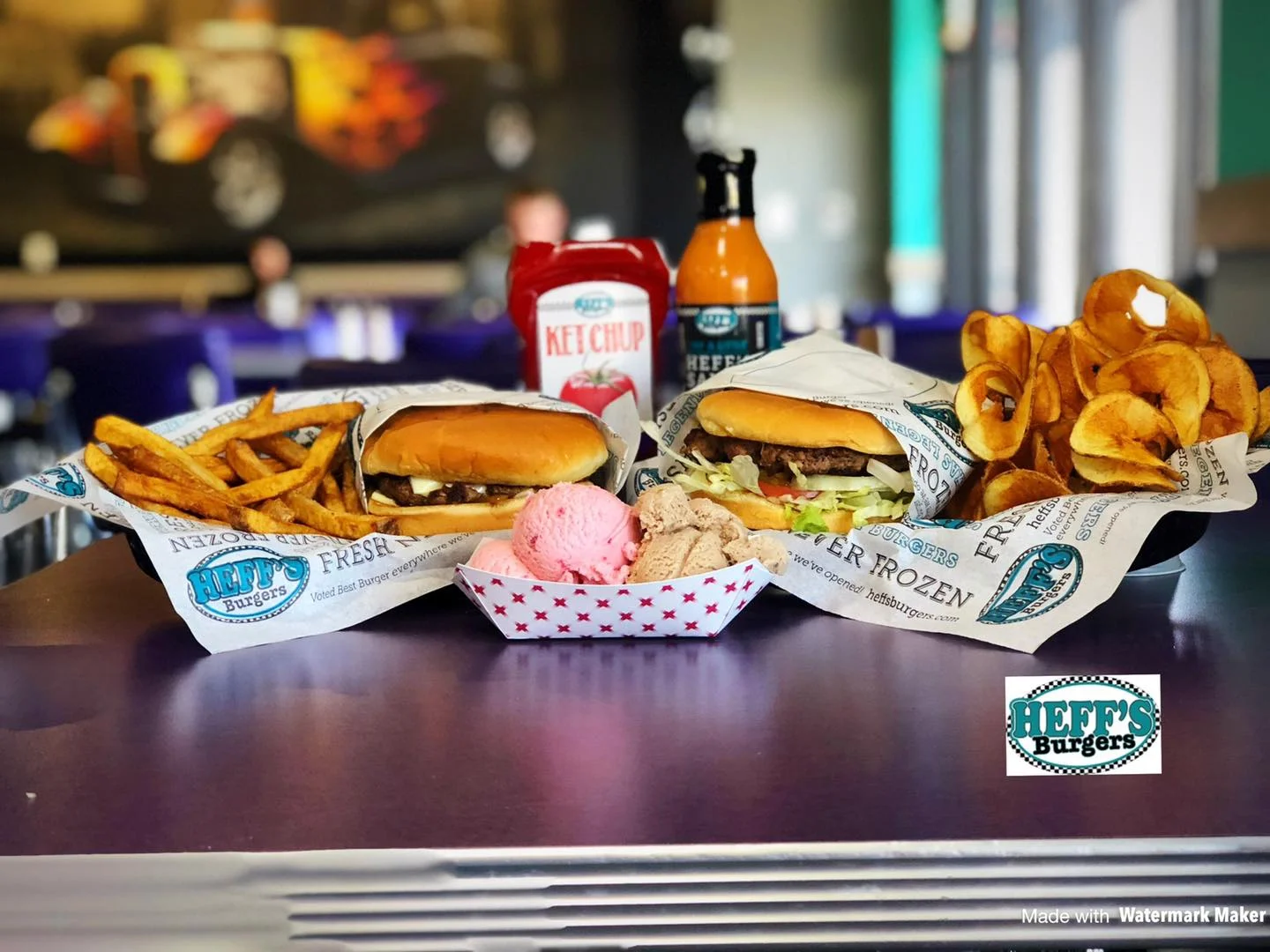 Classic American cheeseburgers with fries and ice cream