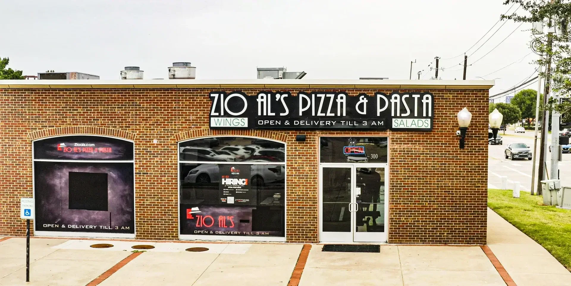 Exterior of Zio Al's Pizza & Pasta restaurant with open sign