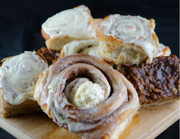Freshly baked cinnamon rolls with cream cheese frosting
